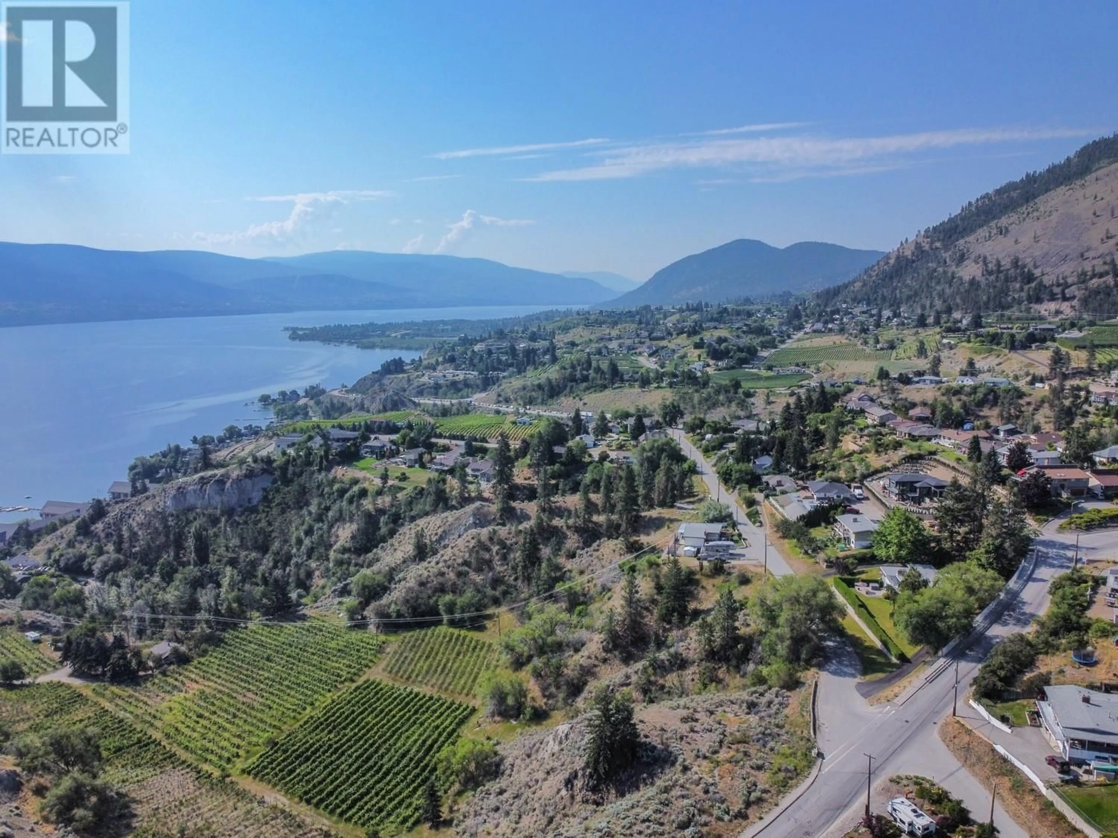 A pic from outside/outdoor area/front of a property/back of a property/a pic from drone, water/lake/river/ocean view for 13420 BRISTOW ROAD, Summerland British Columbia V0H1Z1