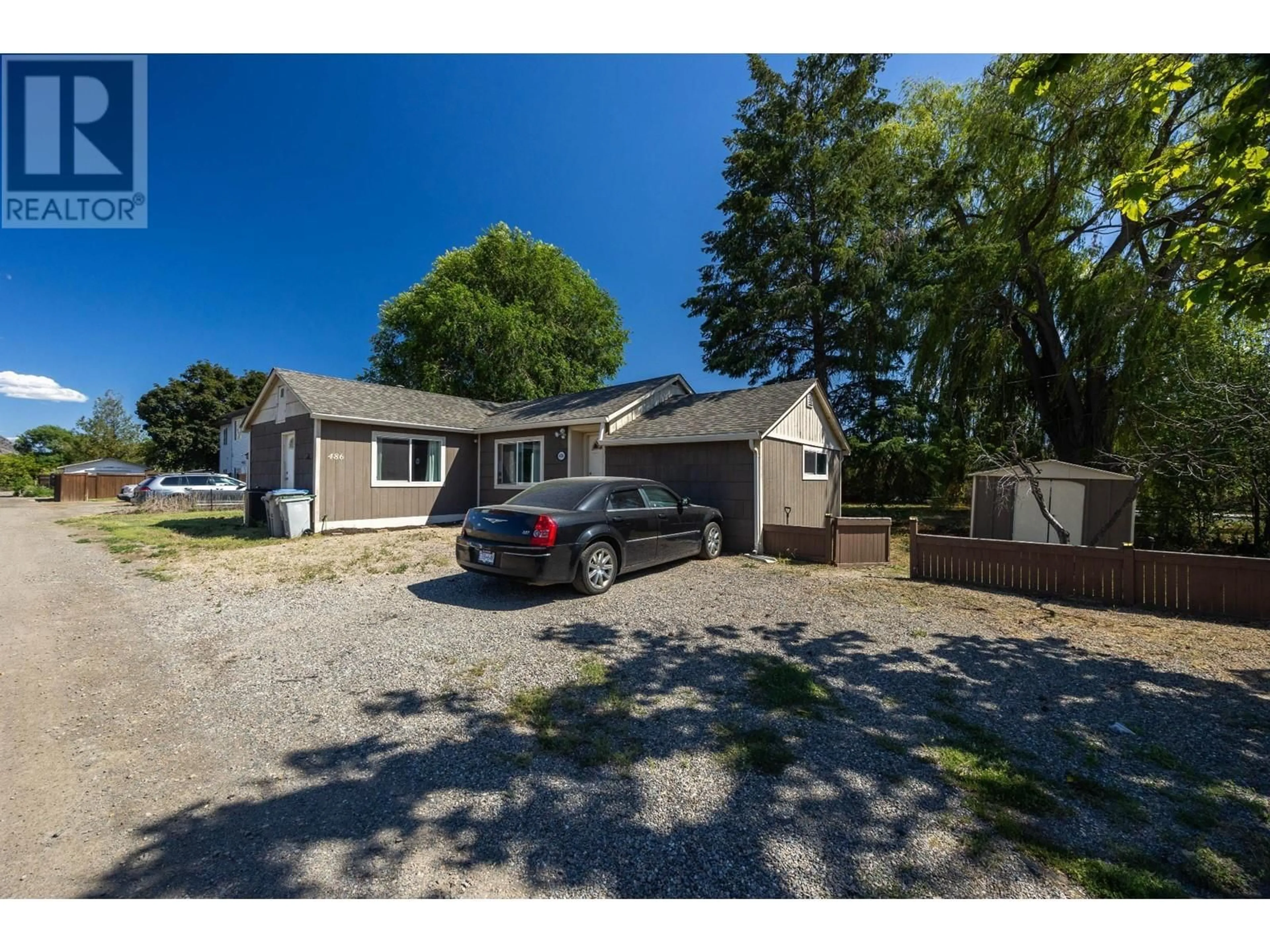 A pic from outside/outdoor area/front of a property/back of a property/a pic from drone, street for 486 FORTUNE DRIVE, Kamloops British Columbia V2H1T7