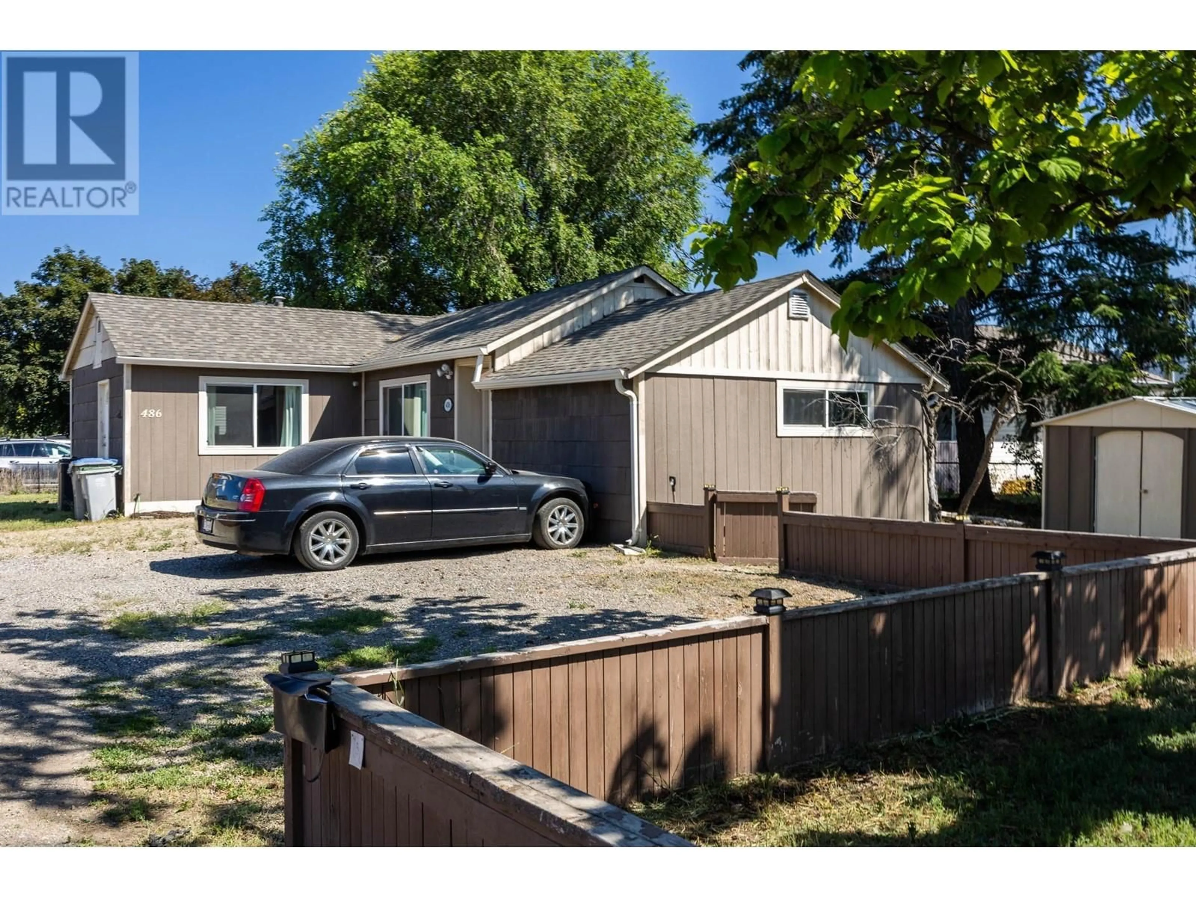 A pic from outside/outdoor area/front of a property/back of a property/a pic from drone, street for 486 FORTUNE DRIVE, Kamloops British Columbia V2H1T7