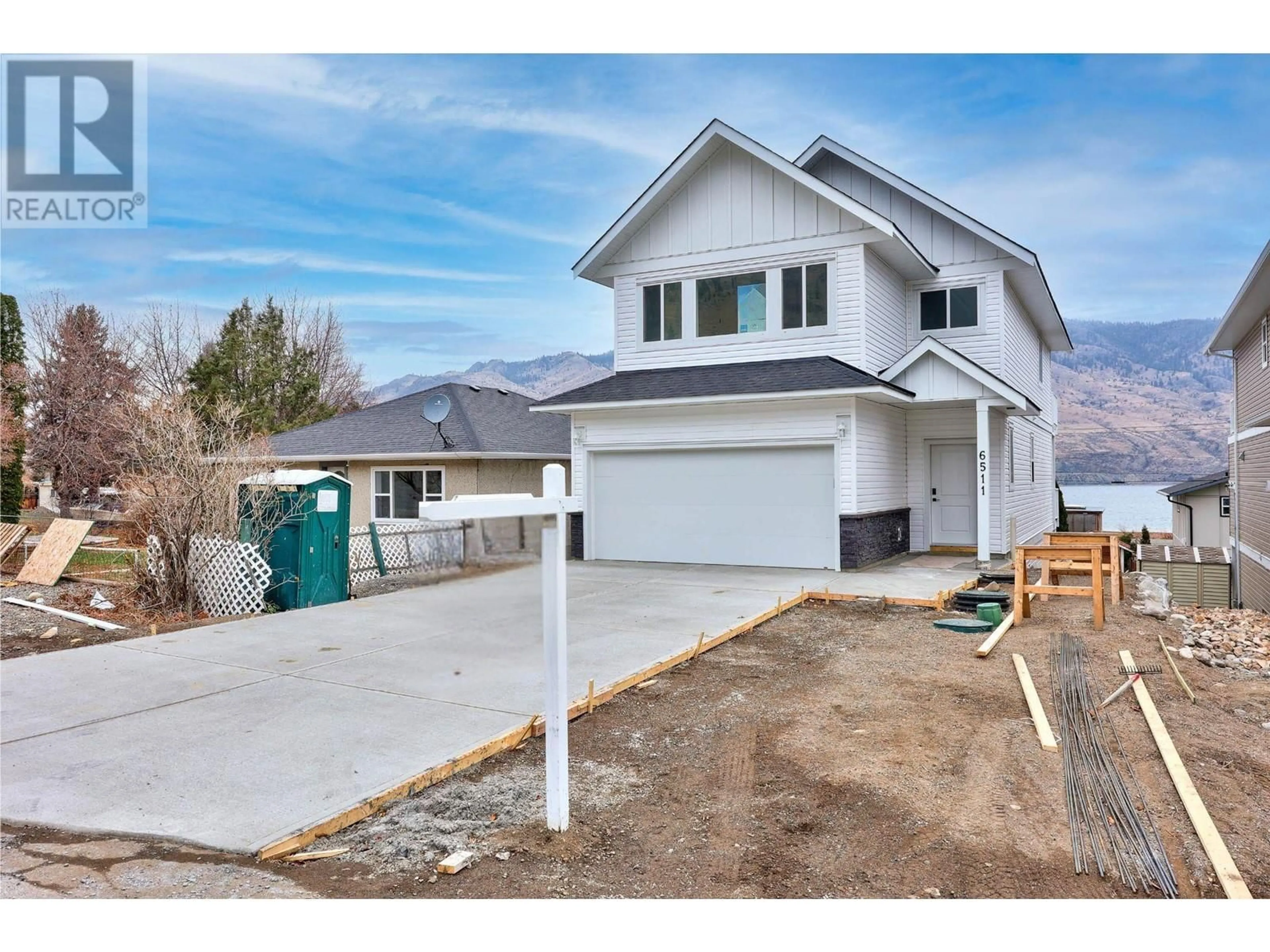 Home with vinyl exterior material, street for 6511 SAVONA ACCESS ROAD, Kamloops British Columbia V2H1T7
