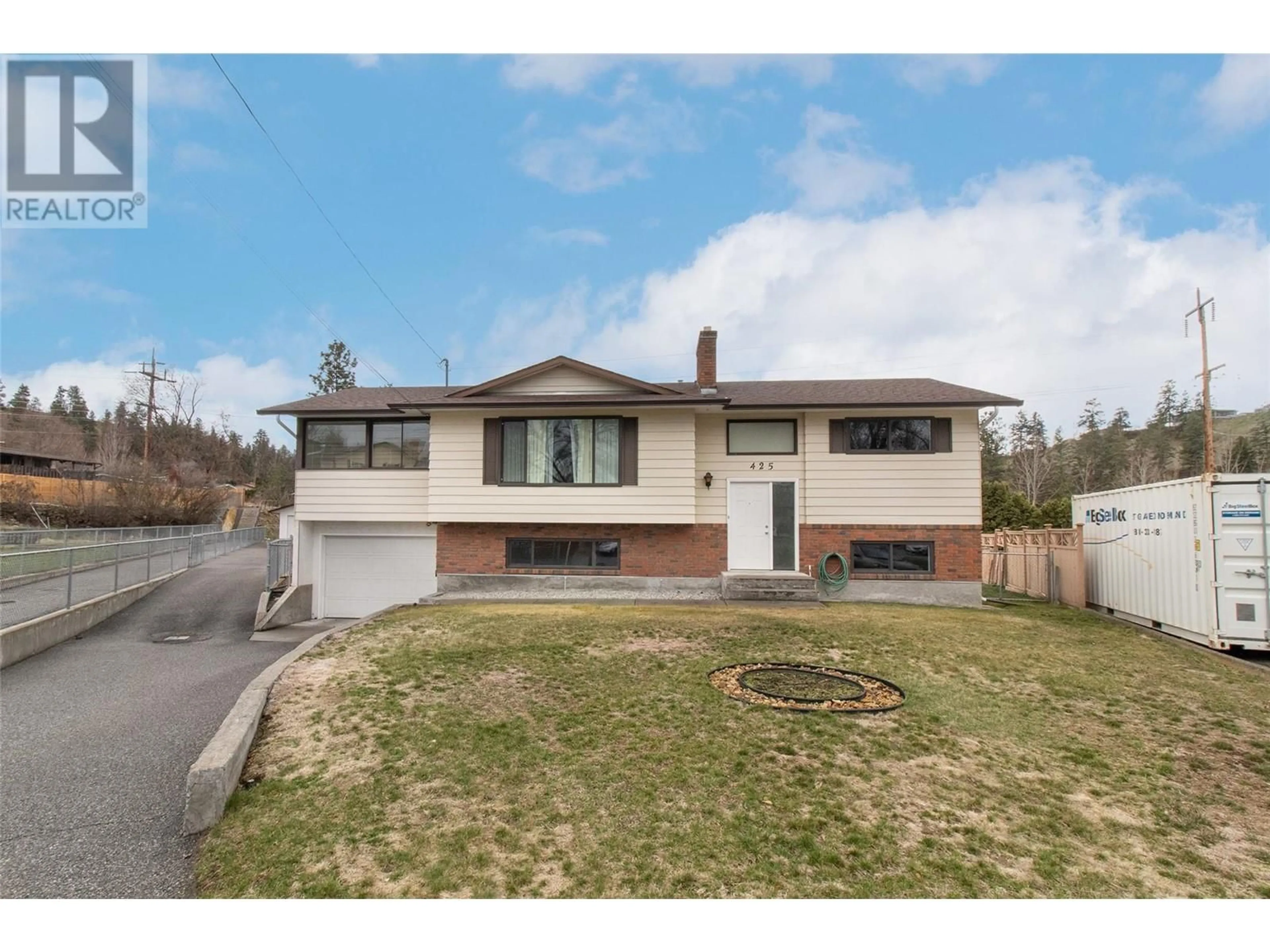 Home with brick exterior material, street for 425 BURBANK COURT, Kelowna British Columbia V1X5R4