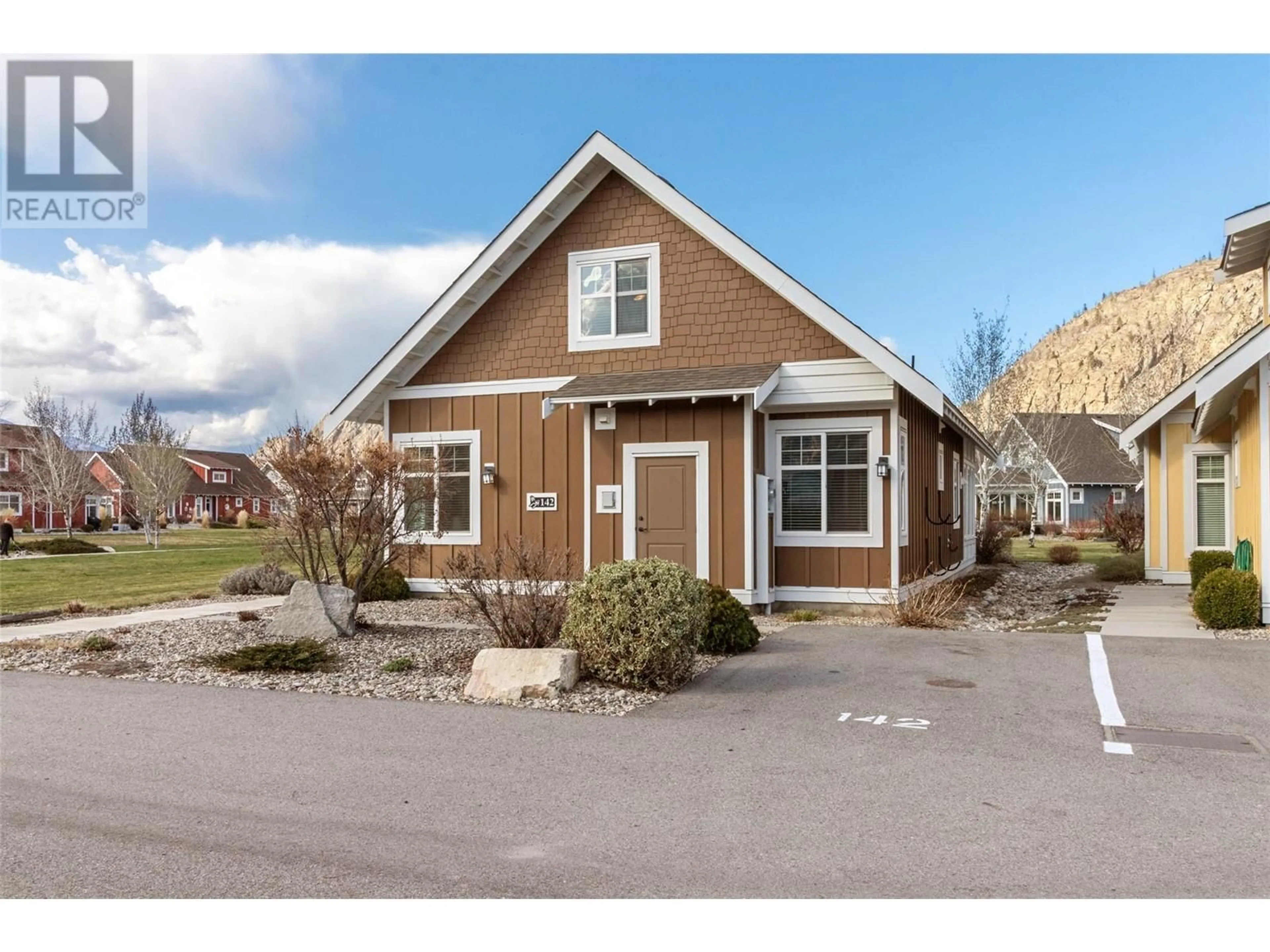 Home with vinyl exterior material, street for 142 - 2450 RADIO TOWER ROAD, Oliver British Columbia V0H1T1