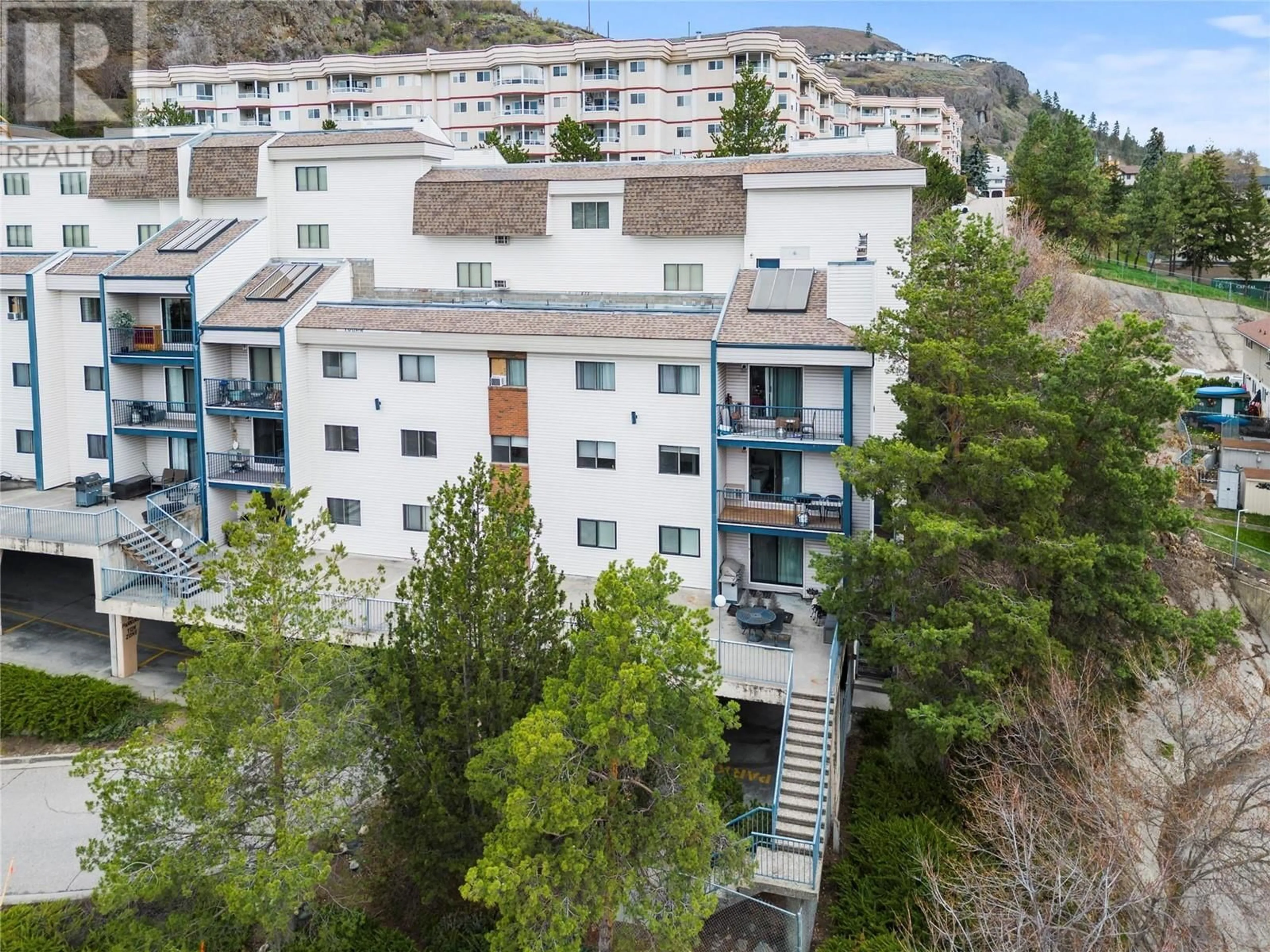A pic from outside/outdoor area/front of a property/back of a property/a pic from drone, city buildings view from balcony for 210 - 3901 32 AVENUE, Vernon British Columbia V1T8M3