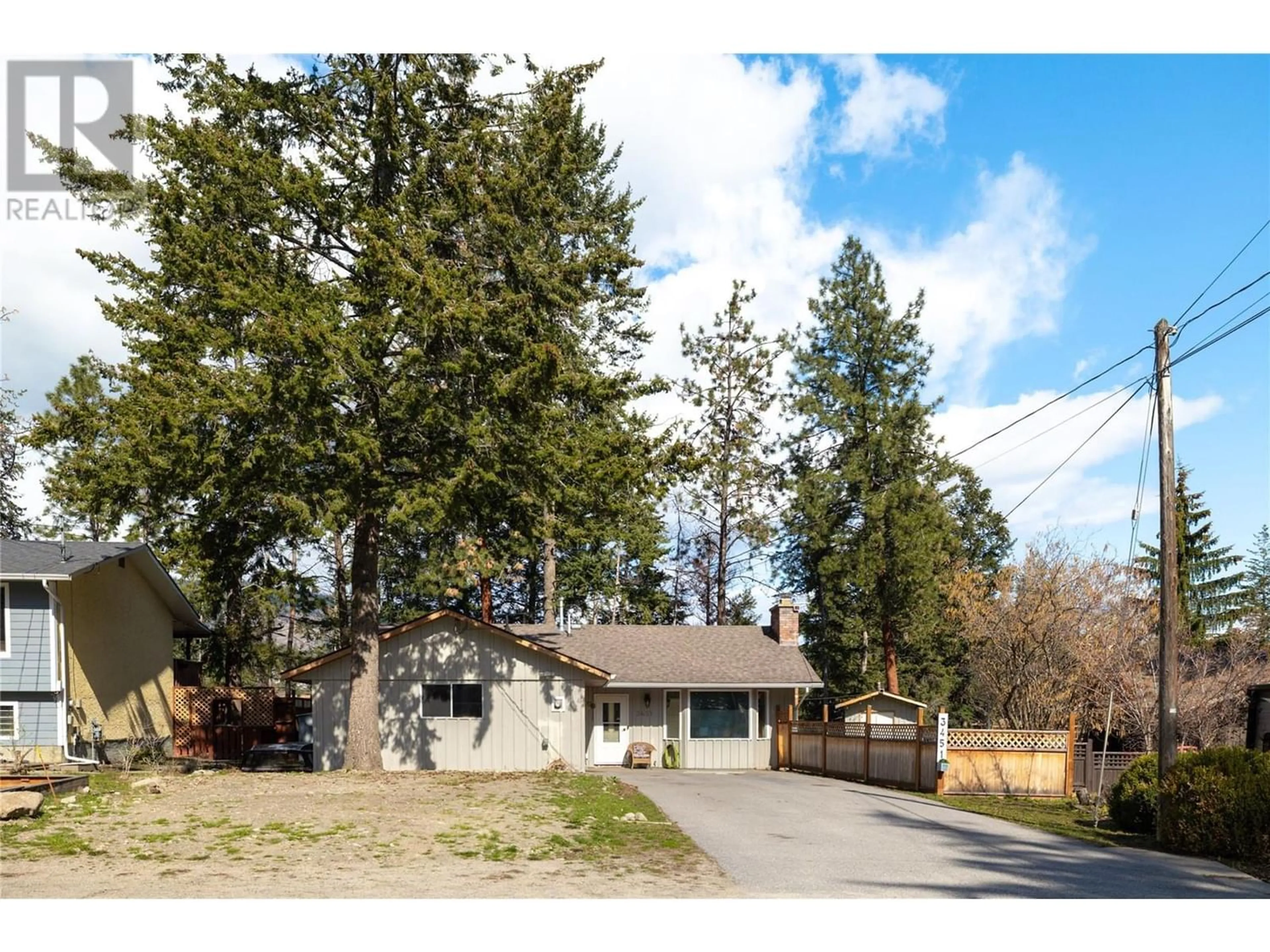 A pic from outside/outdoor area/front of a property/back of a property/a pic from drone, street for 3451 MCTAGGART ROAD, West Kelowna British Columbia V4T1H7