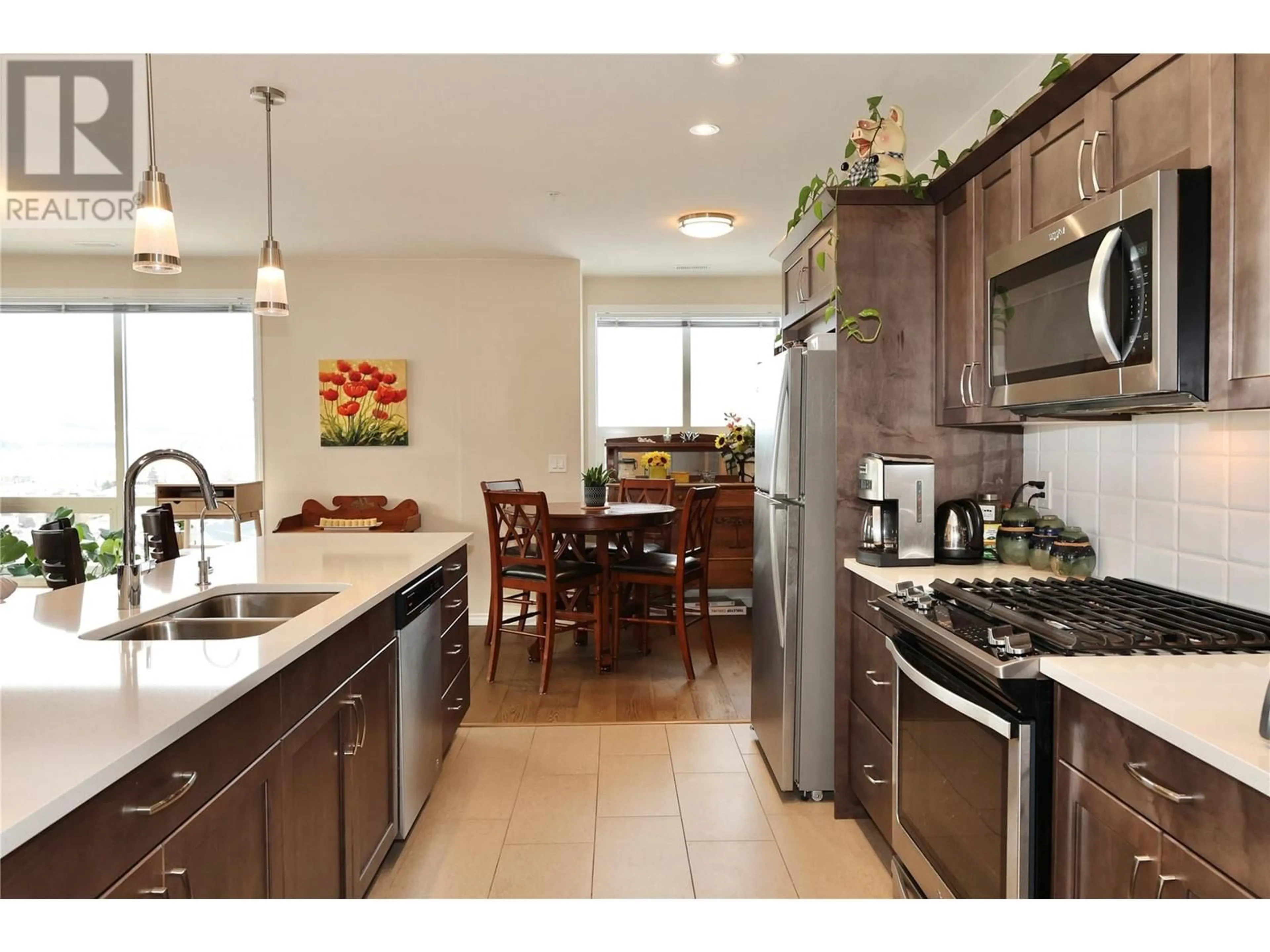 Open concept kitchen, ceramic/tile floor for 1202 - 3346 SKAHA LAKE ROAD, Penticton British Columbia V2A6G4