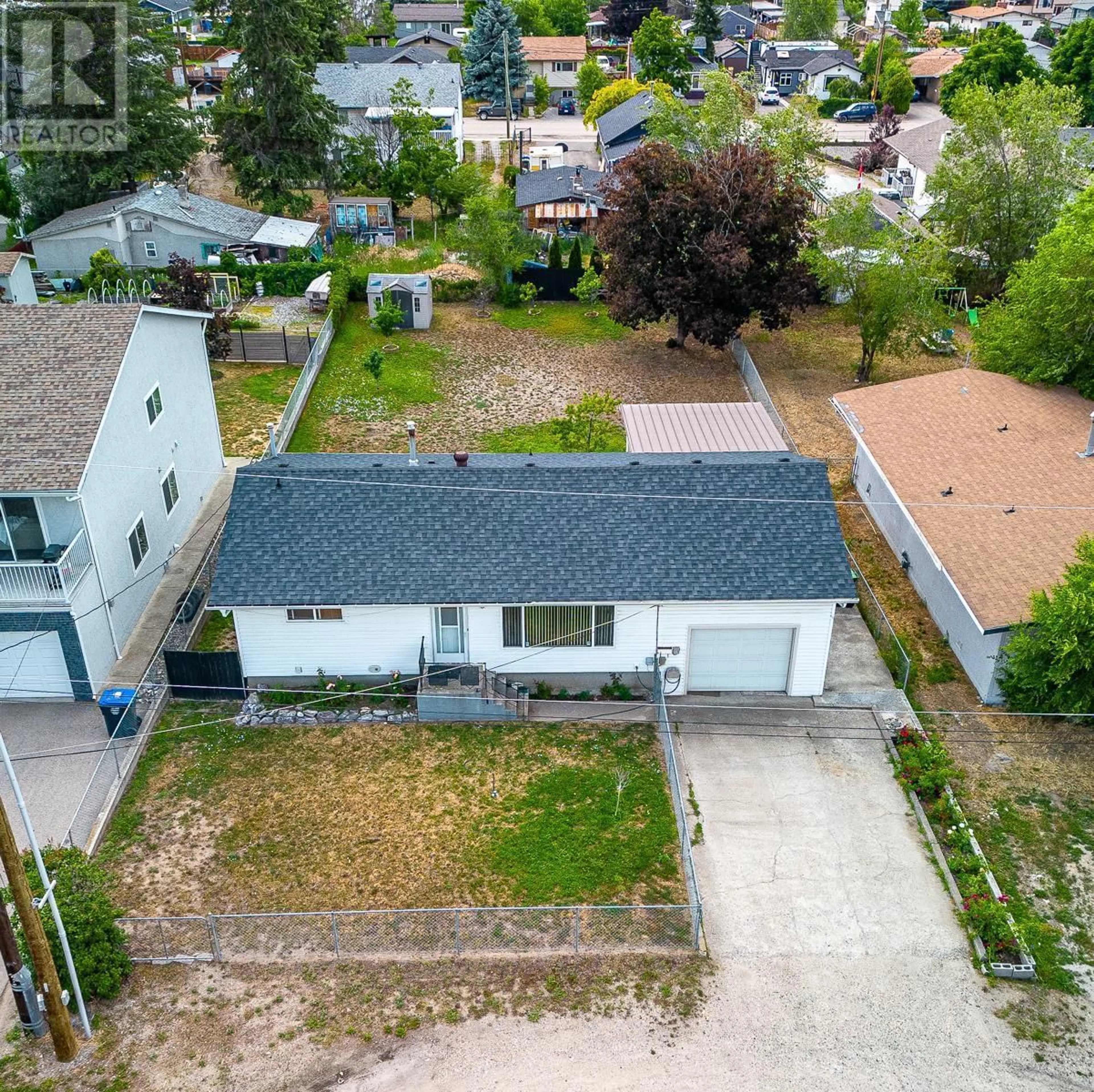 A pic from outside/outdoor area/front of a property/back of a property/a pic from drone, street for 390 ASHER ROAD, Kelowna British Columbia V1X3H7