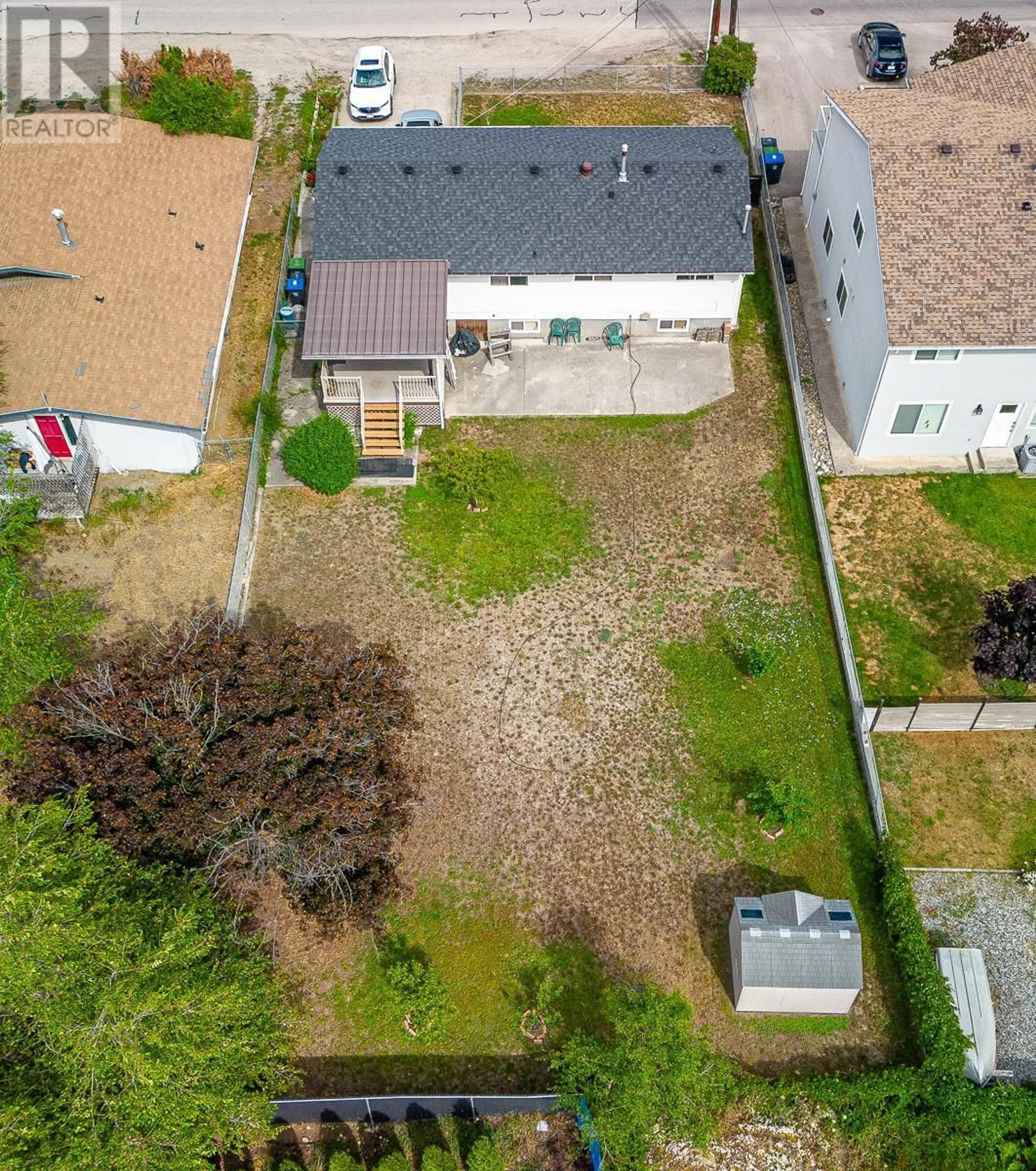 A pic from outside/outdoor area/front of a property/back of a property/a pic from drone, street for 390 ASHER ROAD, Kelowna British Columbia V1X3H7
