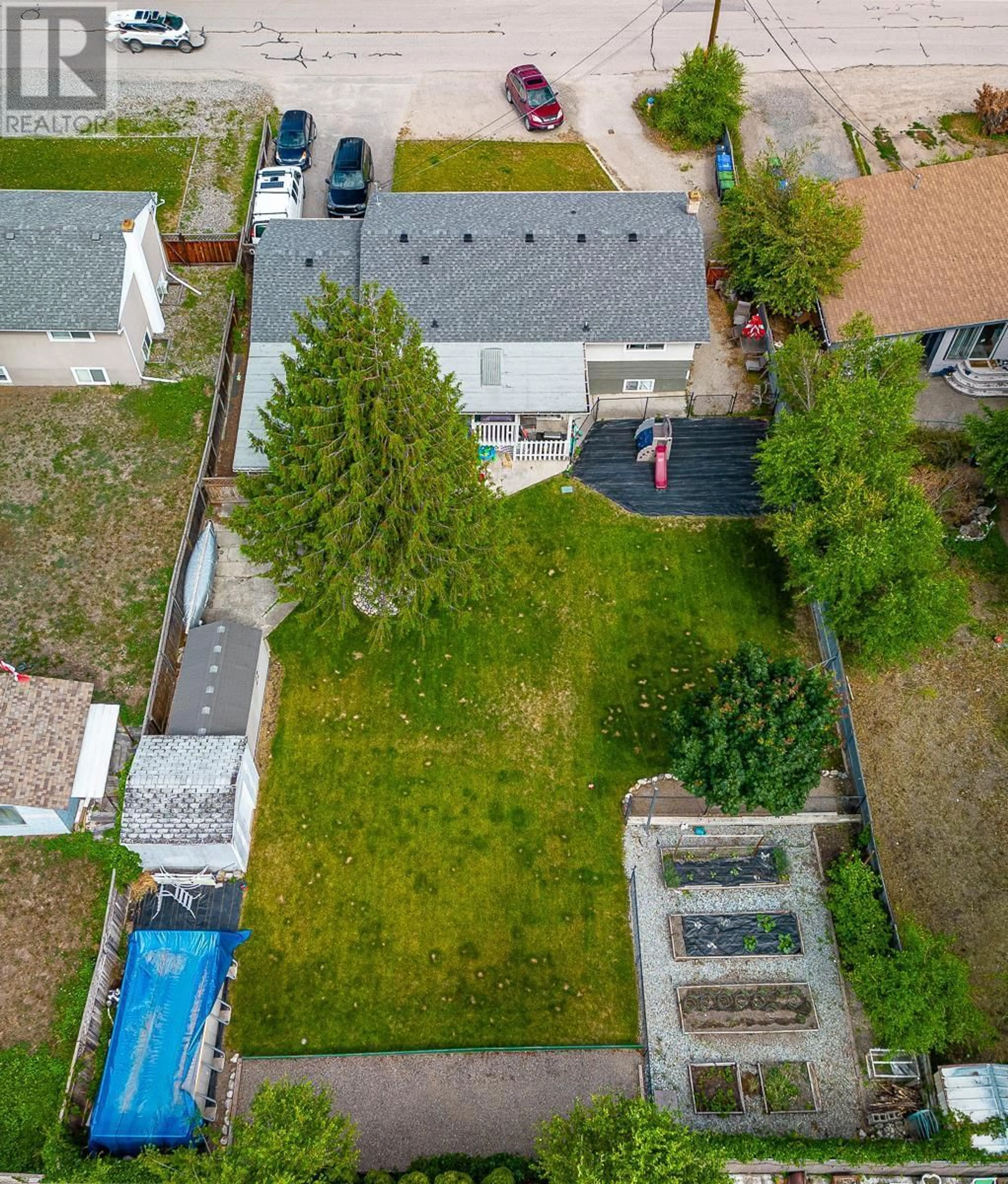 A pic from outside/outdoor area/front of a property/back of a property/a pic from drone, street for 420 ASHER ROAD, Kelowna British Columbia V1X3H7