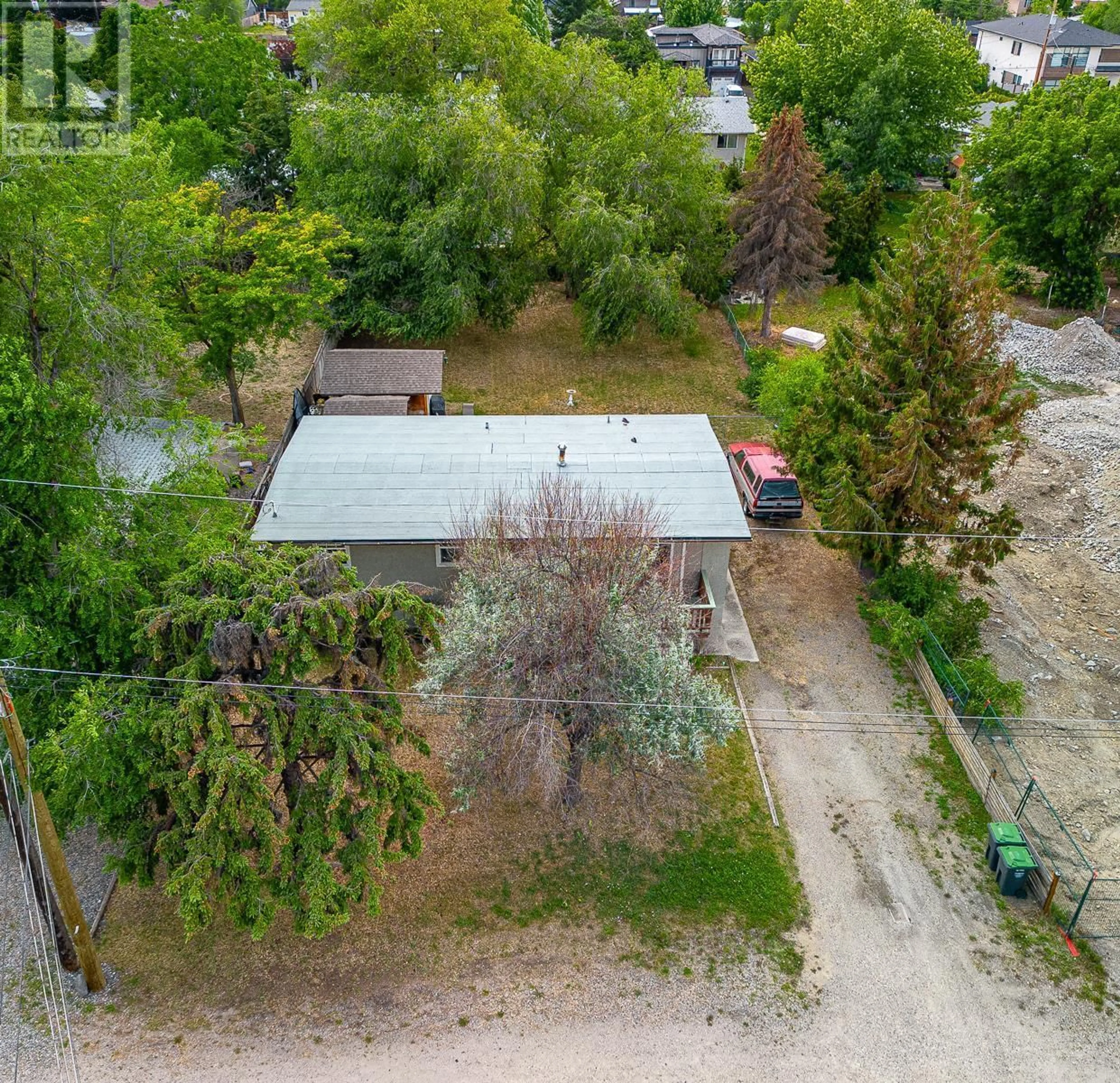 A pic from outside/outdoor area/front of a property/back of a property/a pic from drone, street for 440 ASHER ROAD, Kelowna British Columbia V1X3H7