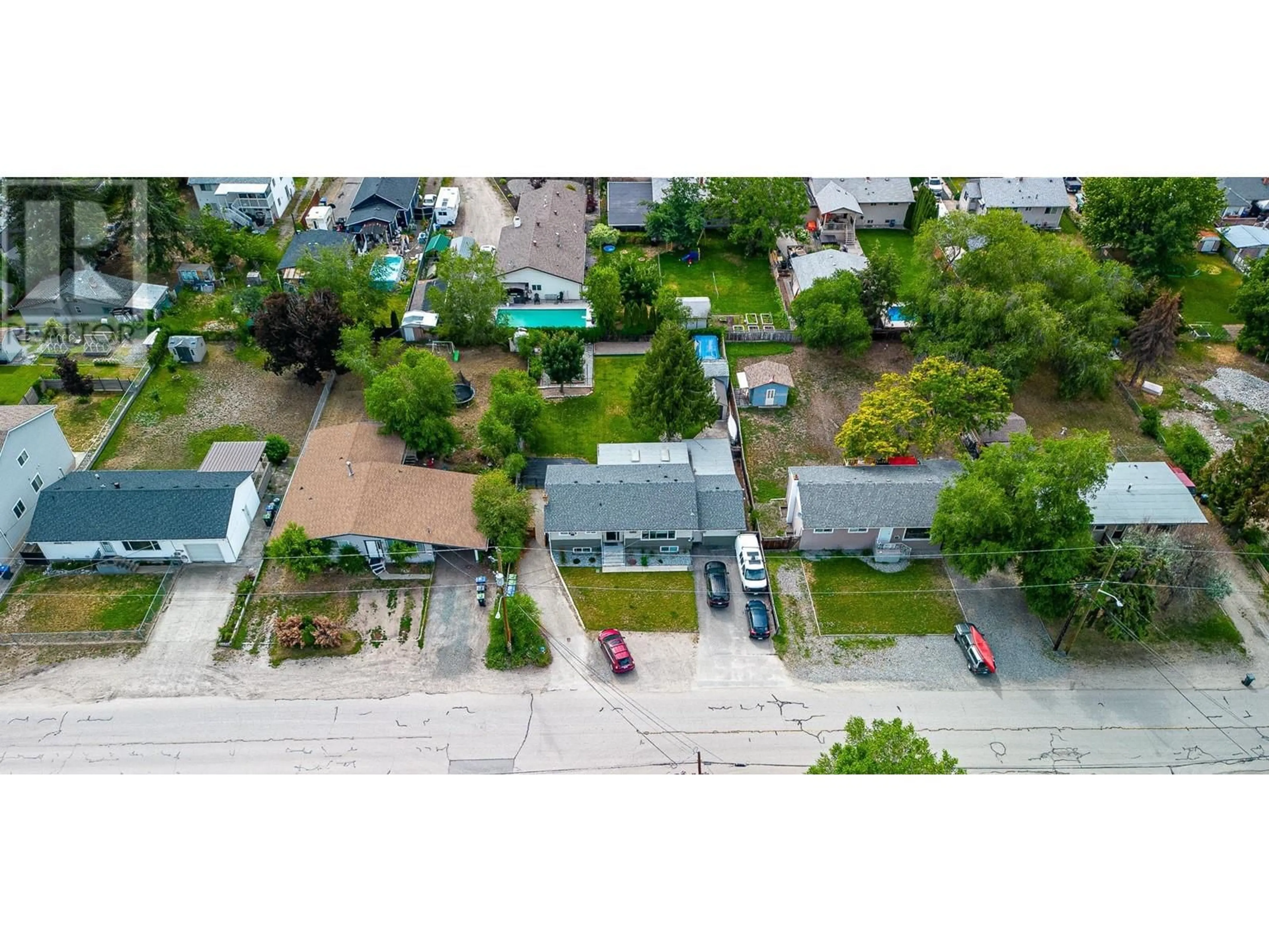 A pic from outside/outdoor area/front of a property/back of a property/a pic from drone, street for 440 ASHER ROAD, Kelowna British Columbia V1X3H7