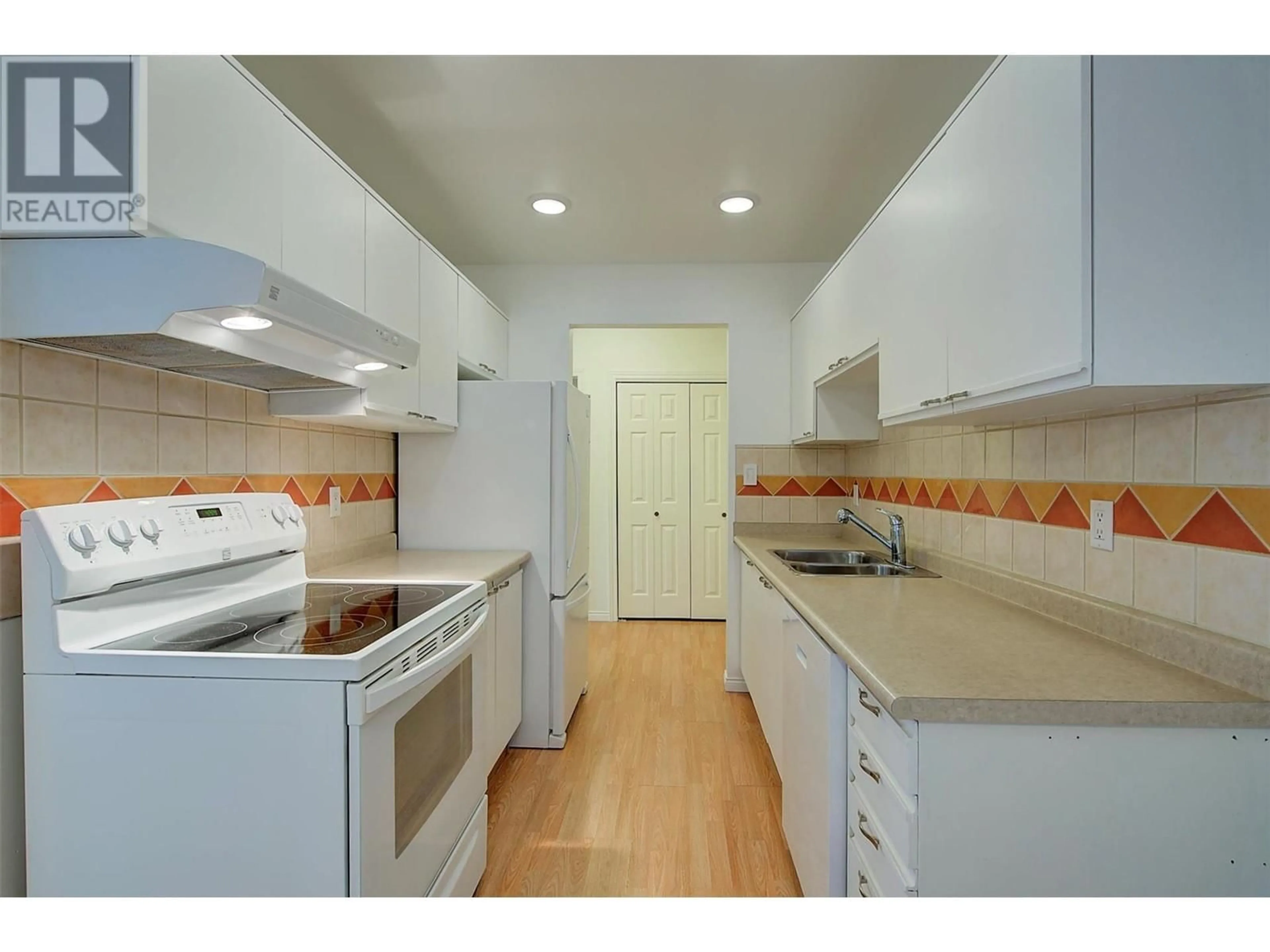 Standard kitchen, ceramic/tile floor for 206 - 1056 BERNARD AVENUE, Kelowna British Columbia V1Y8L7
