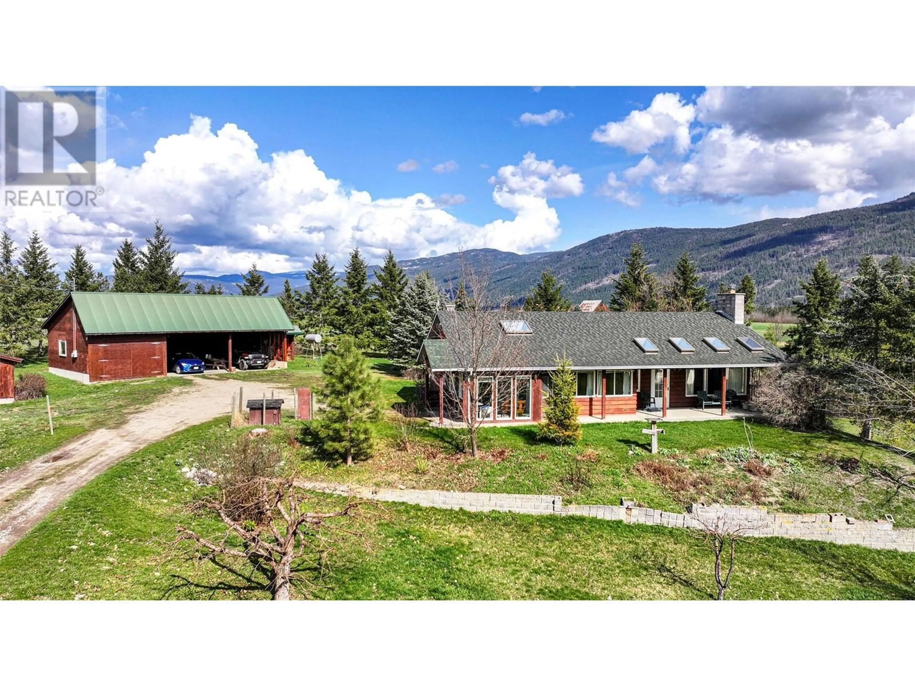 A pic from outside/outdoor area/front of a property/back of a property/a pic from drone, mountain view for 4525 MARSHALL ROAD, Spallumcheen British Columbia V4Y0V4