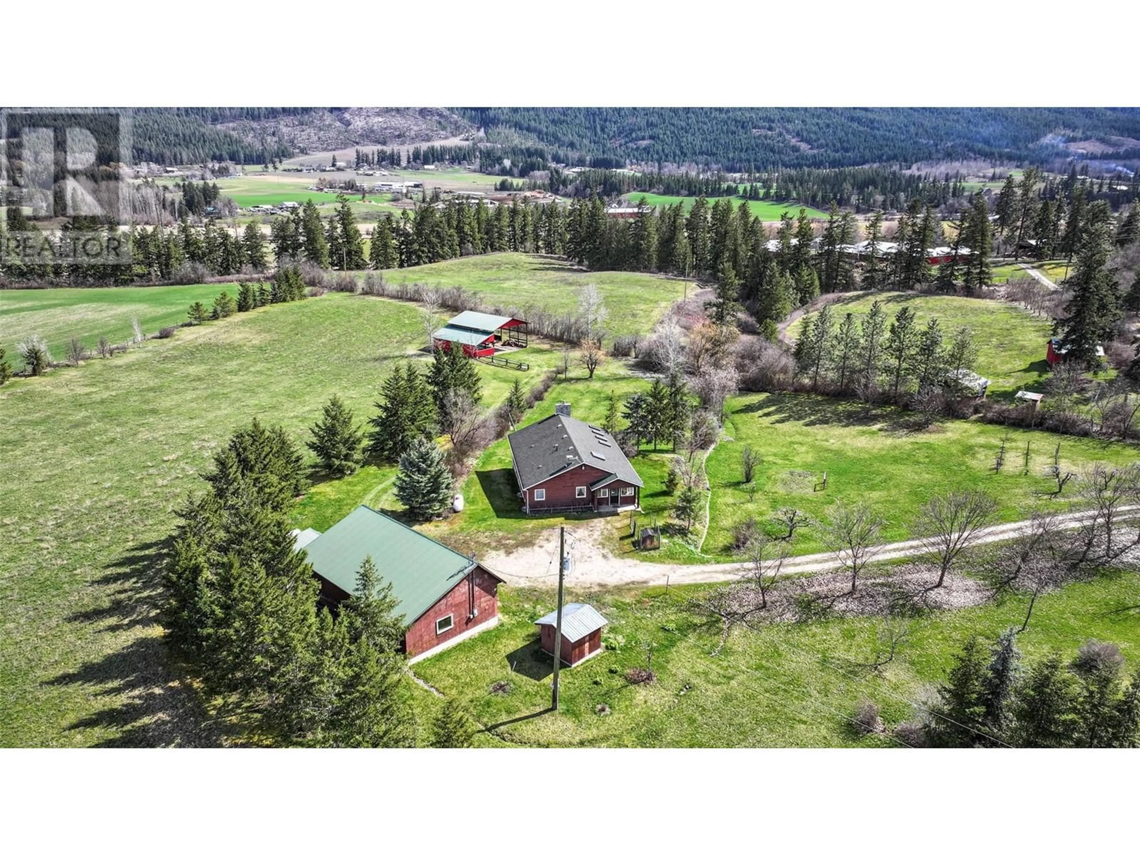A pic from outside/outdoor area/front of a property/back of a property/a pic from drone, mountain view for 4525 MARSHALL ROAD, Spallumcheen British Columbia V4Y0V4