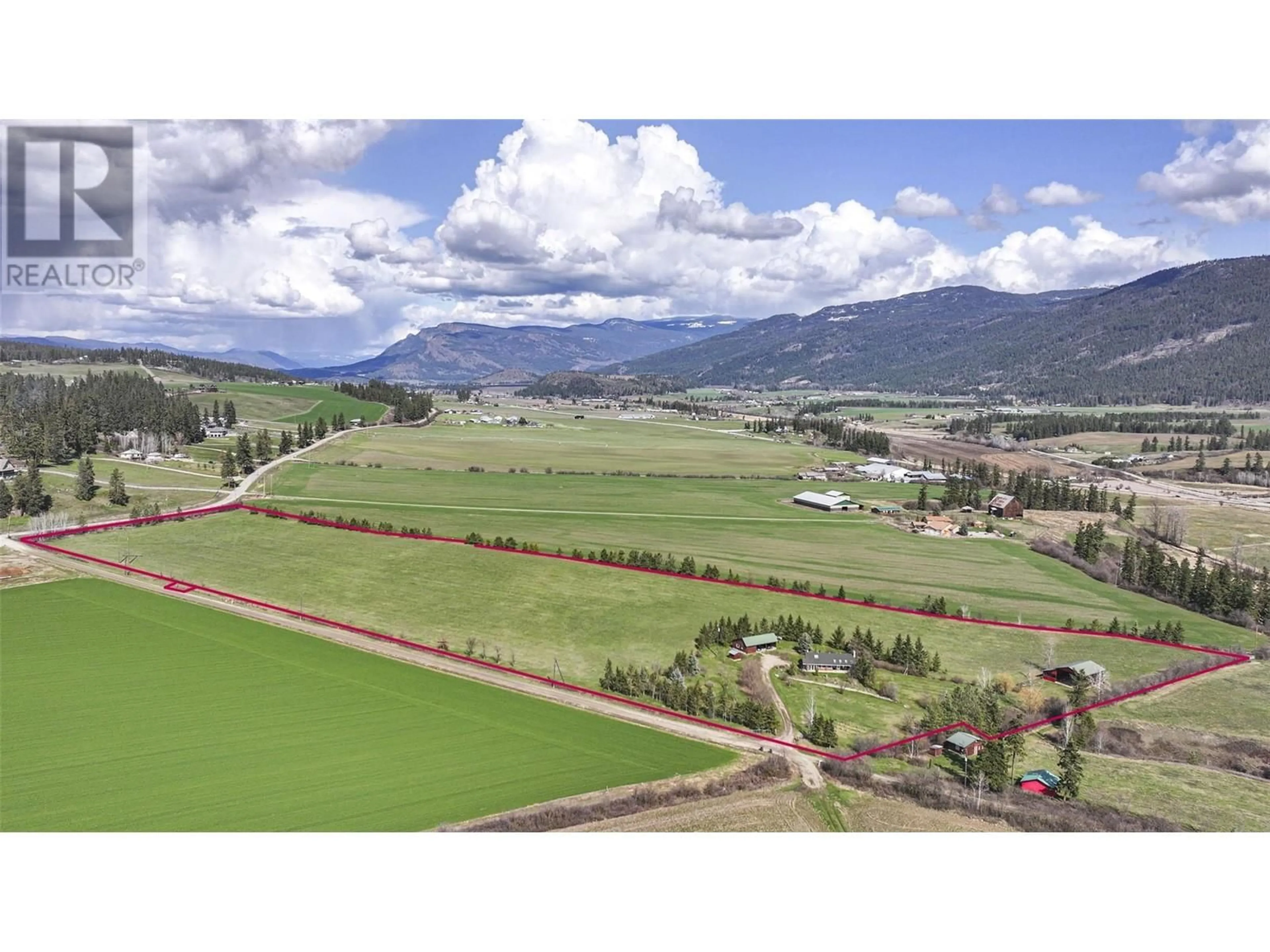 A pic from outside/outdoor area/front of a property/back of a property/a pic from drone, mountain view for 4525 MARSHALL ROAD, Spallumcheen British Columbia V4Y0V4