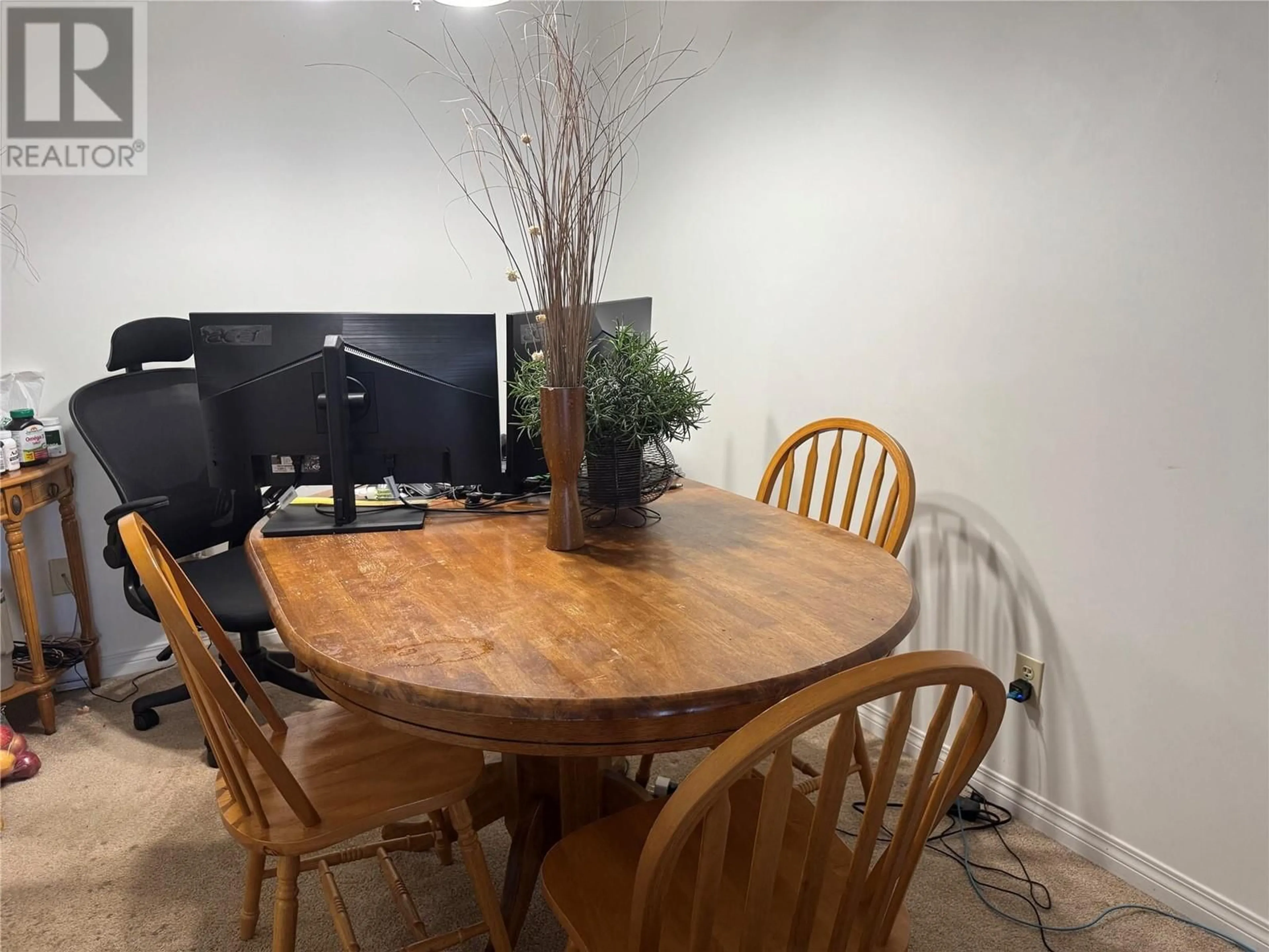 Dining room, wood/laminate floor for 202 - 212 SPIEKER AVENUE, Tumbler Ridge British Columbia V0C2W0