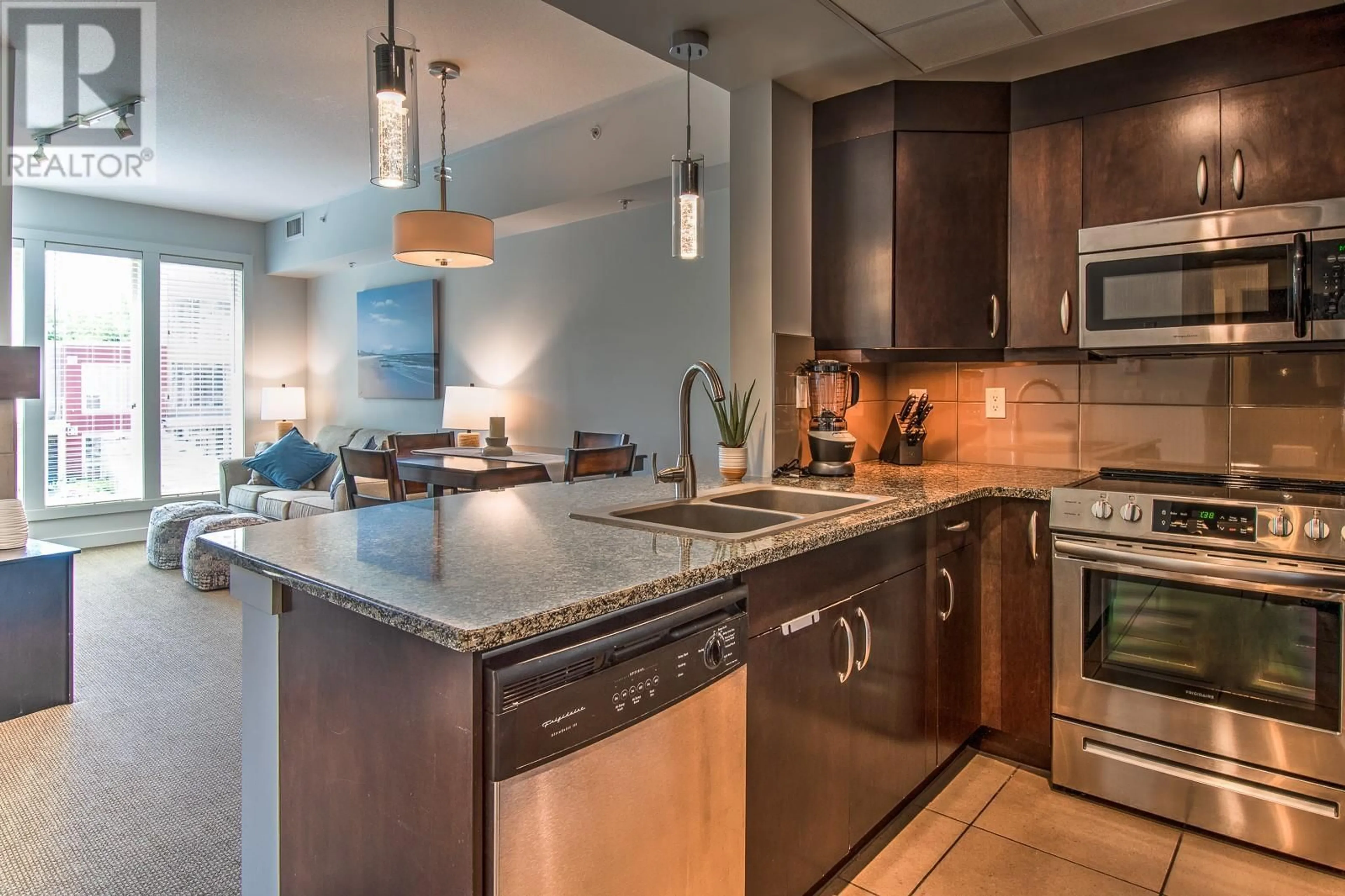 Open concept kitchen, ceramic/tile floor for 1228 - 7343 OKANAGAN LANDING ROAD, Vernon British Columbia V1H2J6