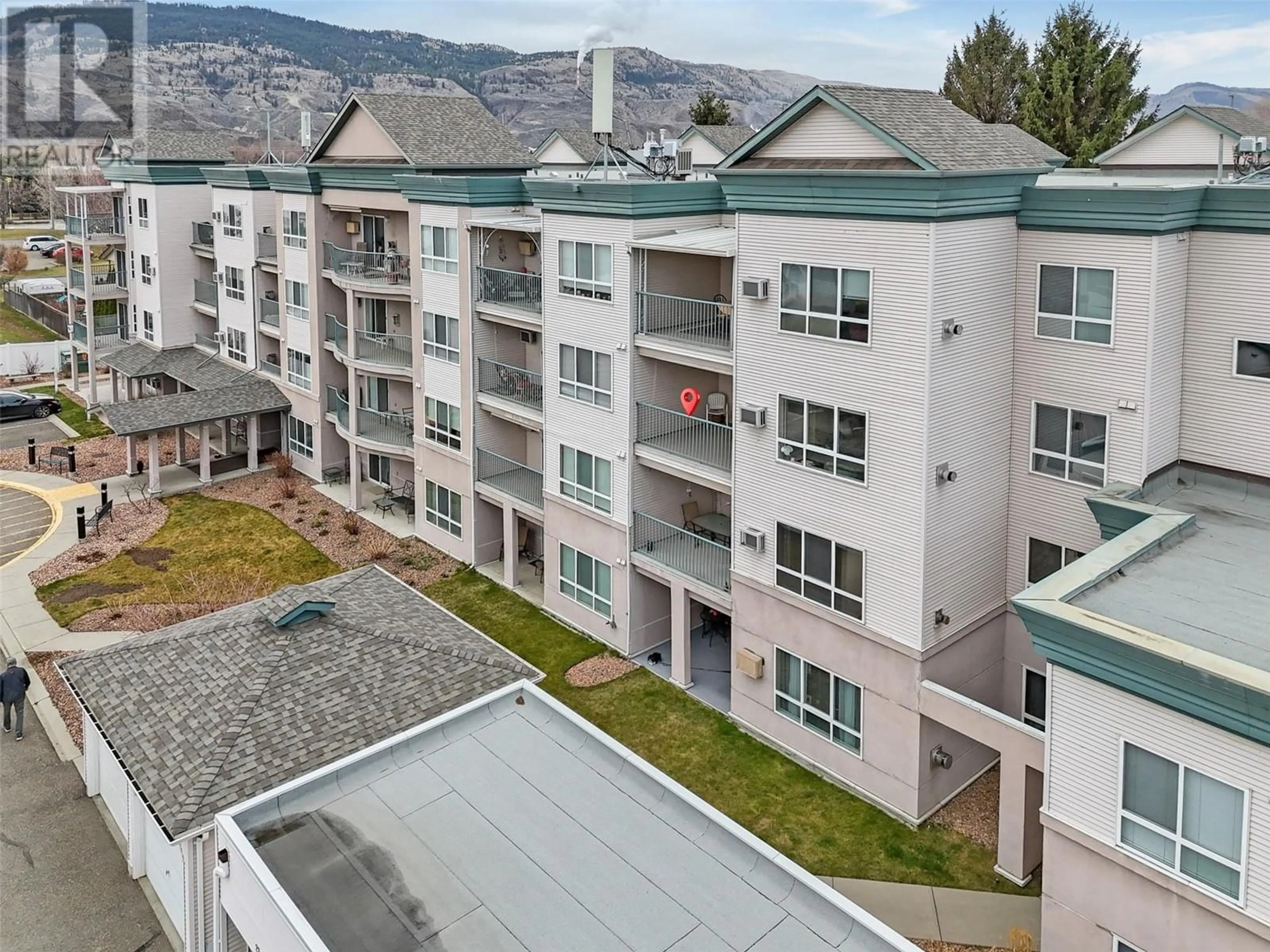 A pic from outside/outdoor area/front of a property/back of a property/a pic from drone, mountain view for 308 - 860 NICOLANI DRIVE, Kamloops British Columbia V2B5B3