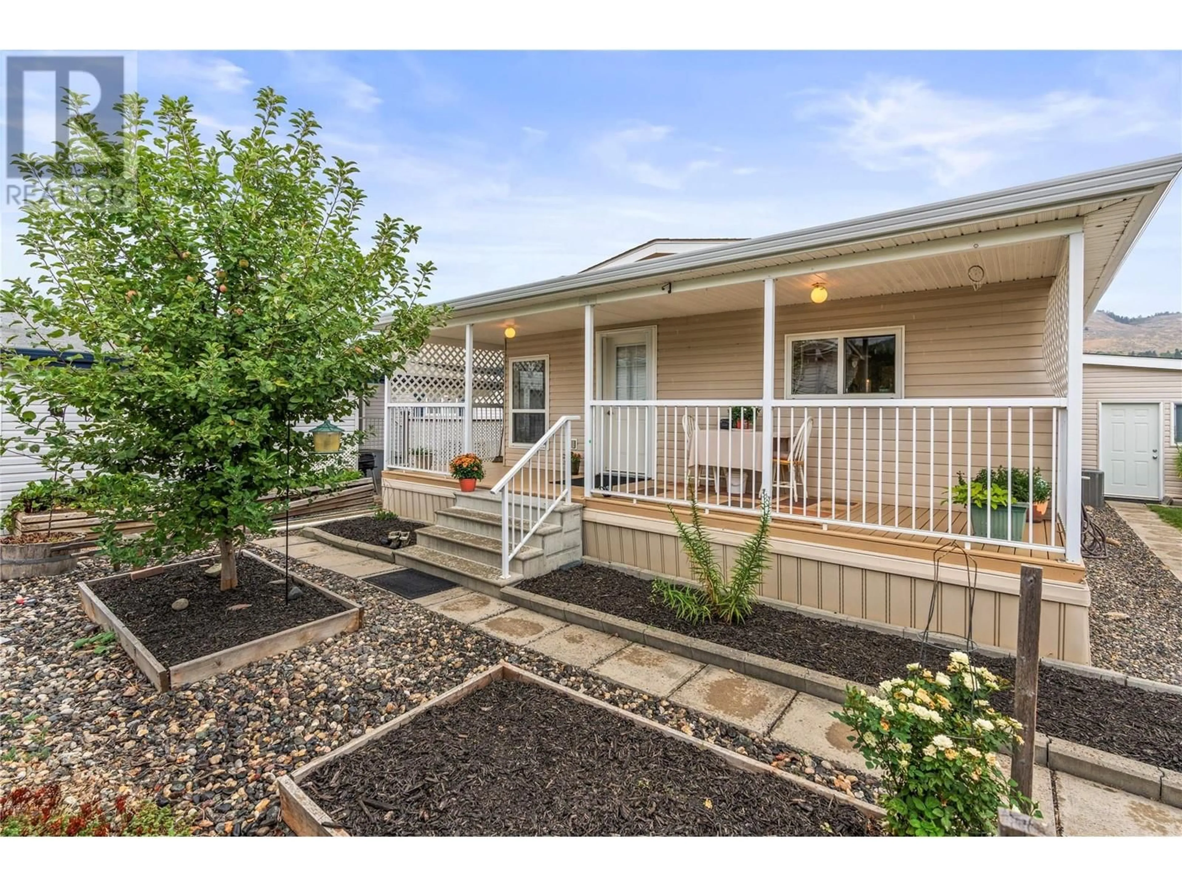 Home with vinyl exterior material, street for 85 - 6688 TRONSON ROAD, Vernon British Columbia V1H1R9