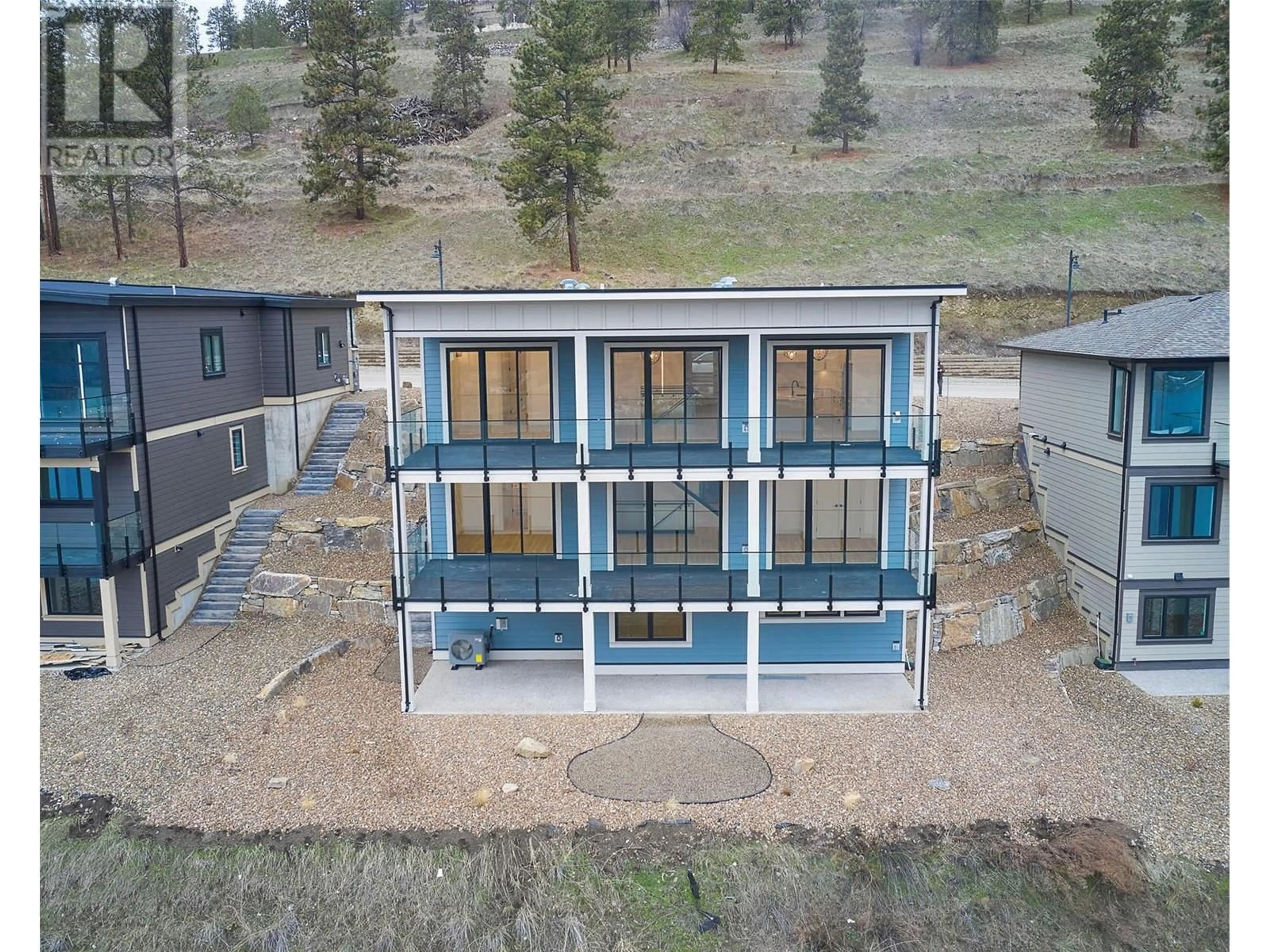 A pic from outside/outdoor area/front of a property/back of a property/a pic from drone, building for 8932 TAVISTOCK ROAD, Vernon British Columbia V1H2L4