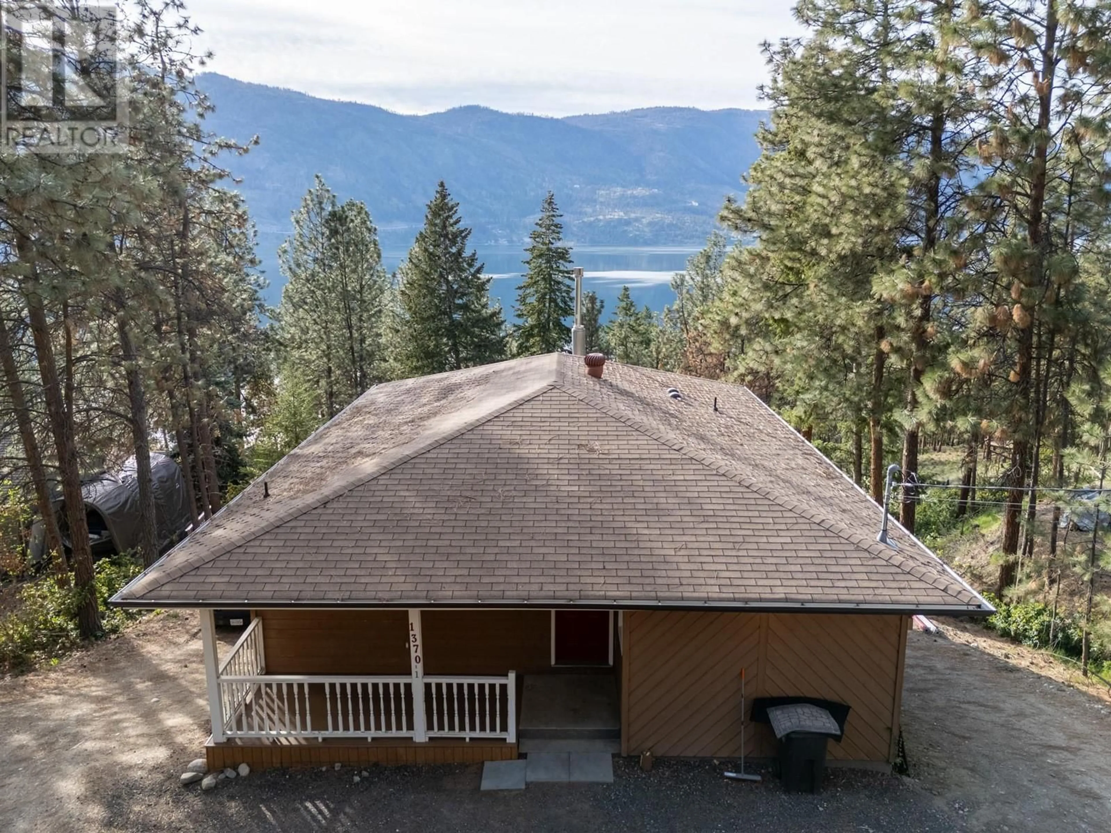 A pic from outside/outdoor area/front of a property/back of a property/a pic from drone, mountain view for 1370 MCKINLEY ROAD, Kelowna British Columbia V8V2B7