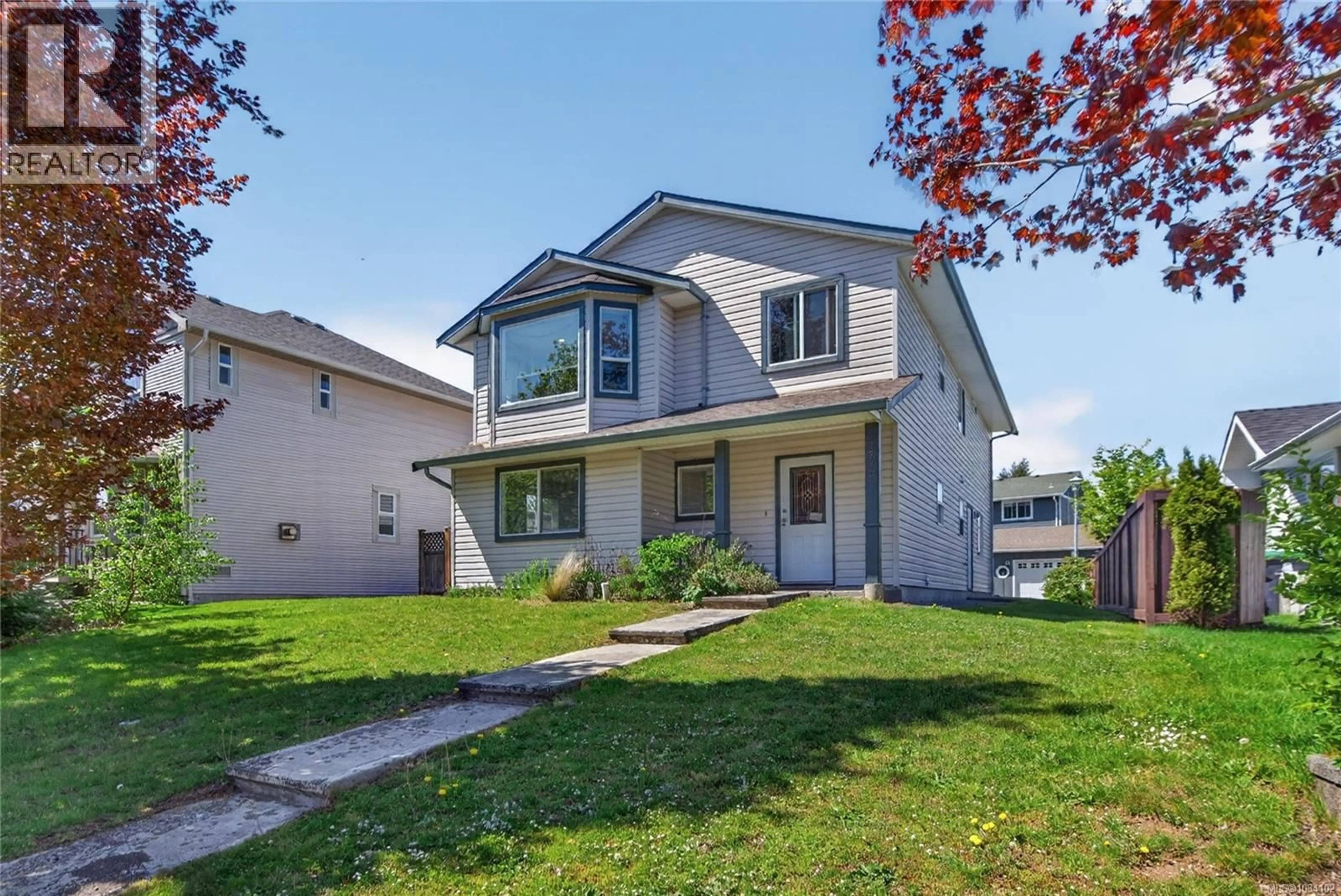 Home with vinyl exterior material, street for 1270 NOEL AVENUE, Comox British Columbia V9M4A3