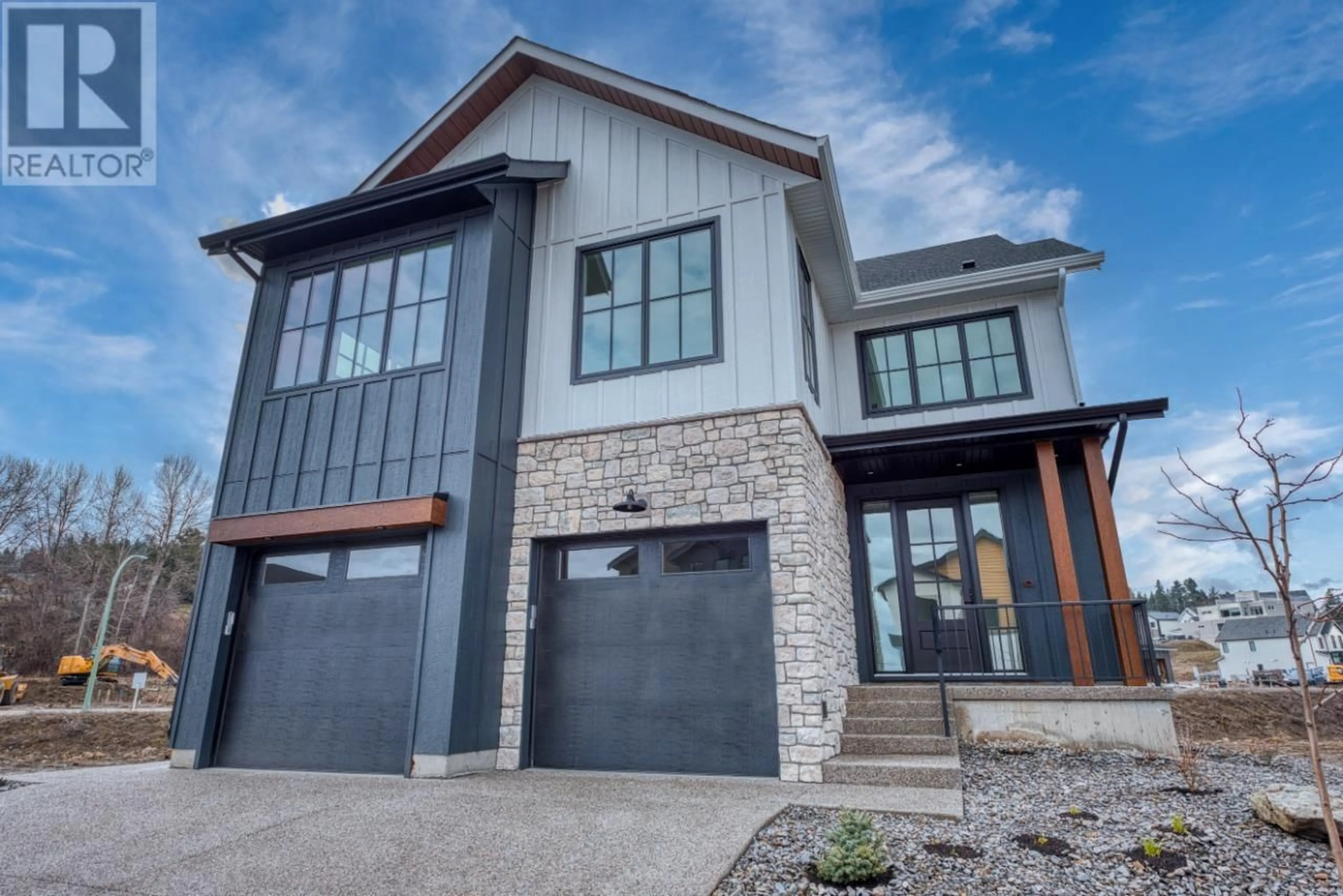 Home with brick exterior material, street for 937 BULL CRESCENT, Kelowna British Columbia V1W0E6