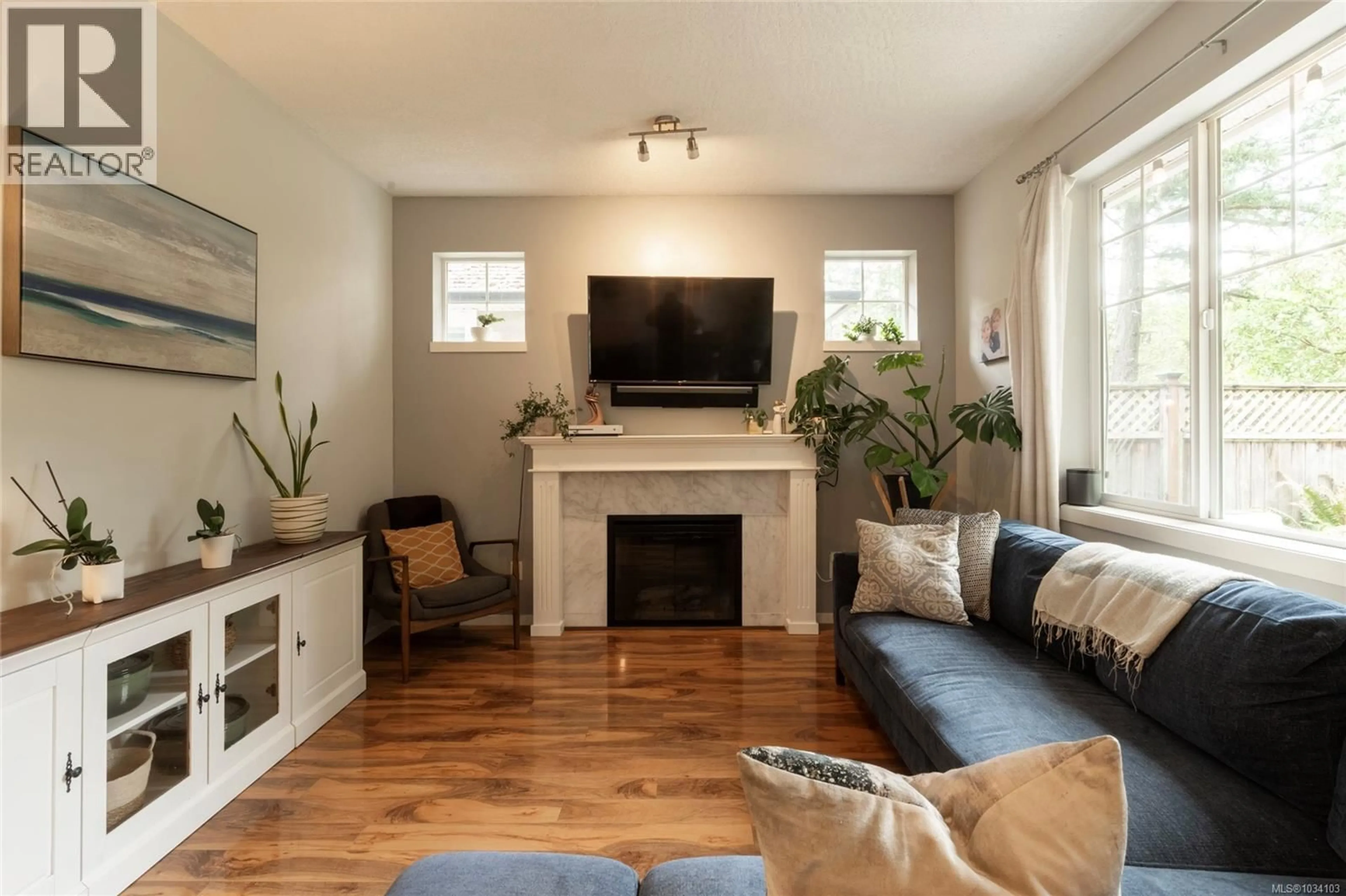 Living room with furniture, wood/laminate floor for 3584 VITALITY ROAD, Langford British Columbia V9C0E9