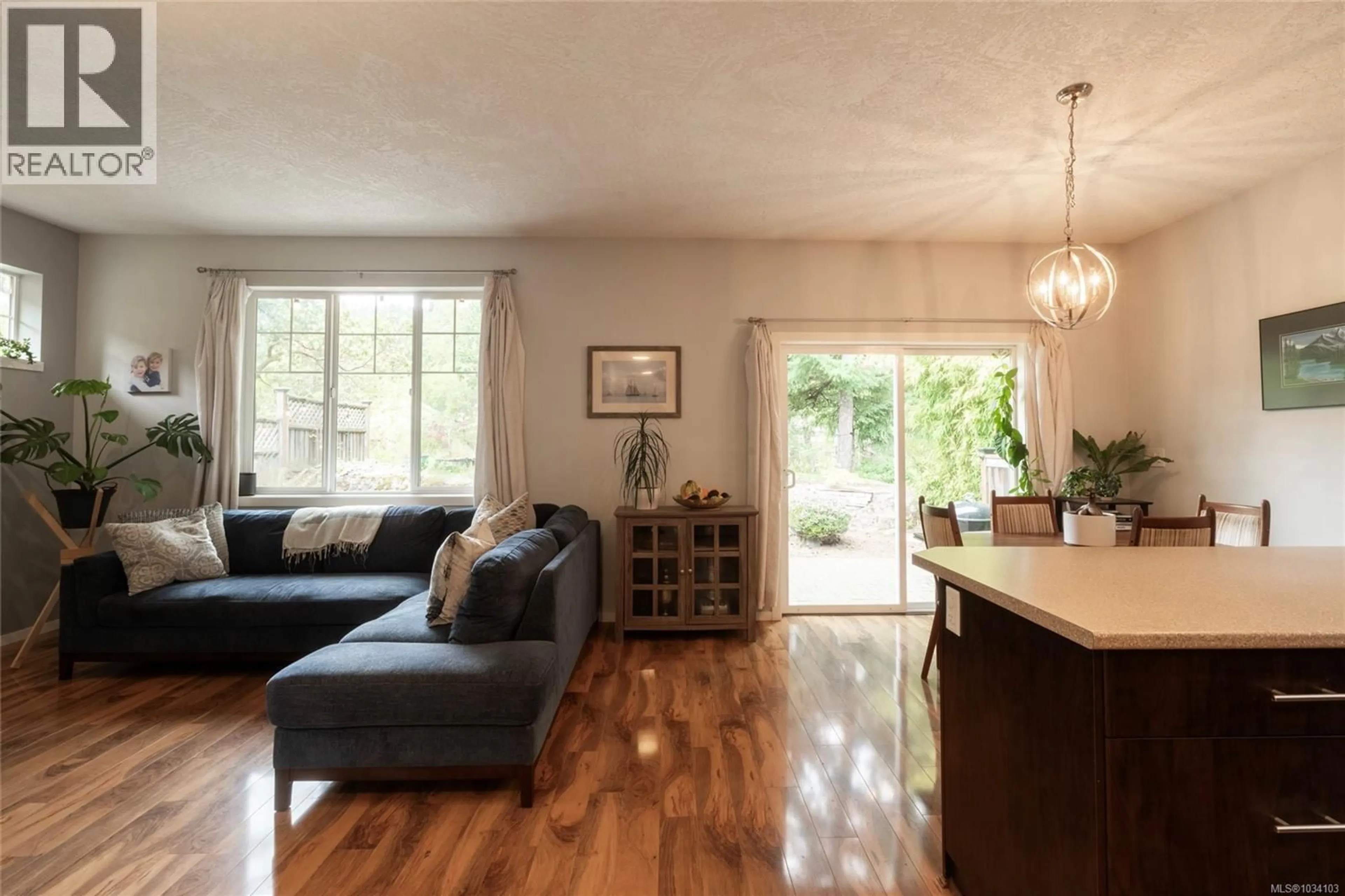 Living room with furniture, wood/laminate floor for 3584 VITALITY ROAD, Langford British Columbia V9C0E9