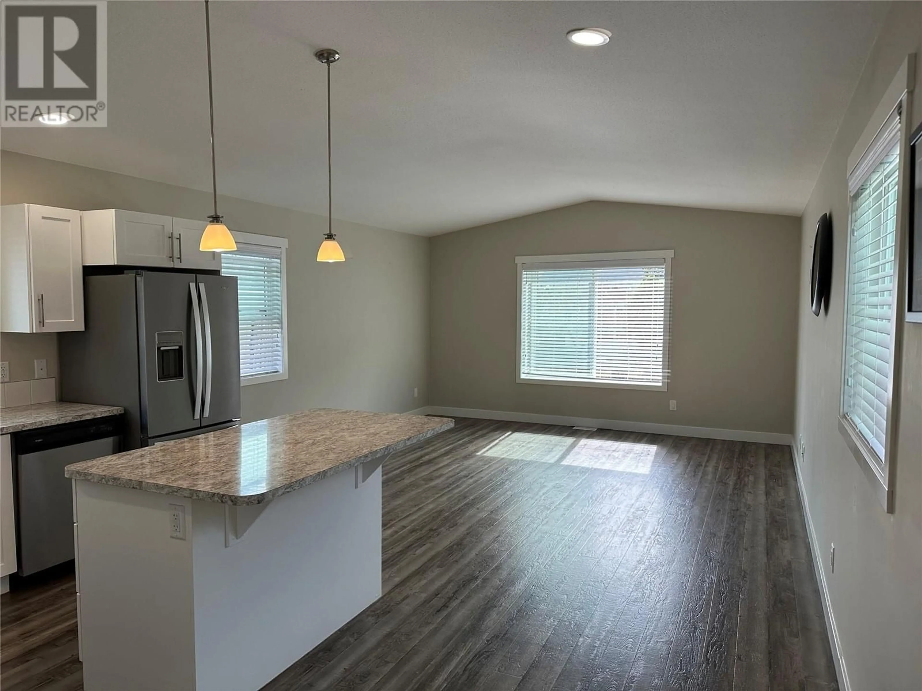 Open concept kitchen, wood/laminate floor for 13 - 1302 CEDAR STREET, Okanagan Falls British Columbia V0H1R4