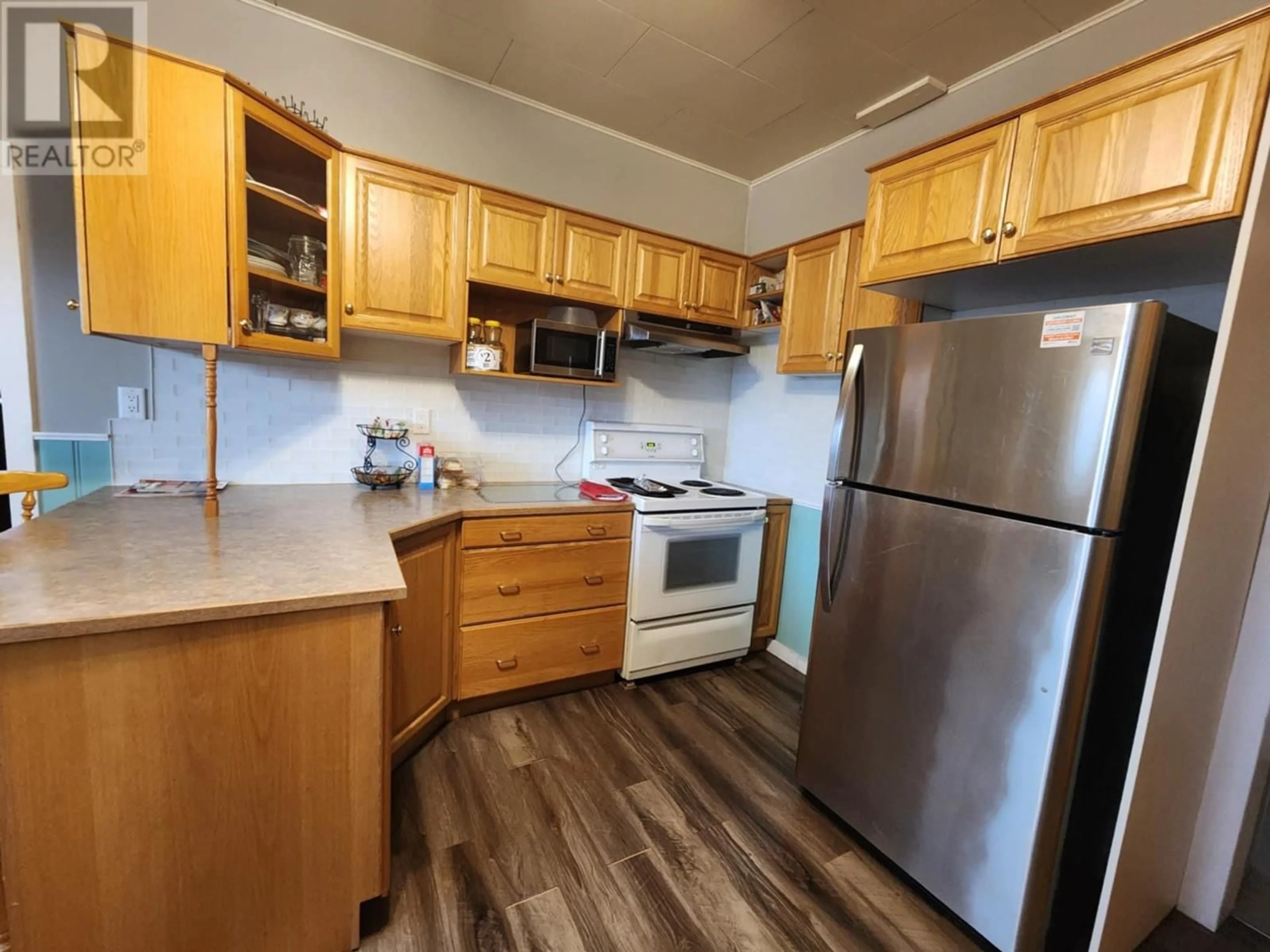 Standard kitchen, wood/laminate floor for 512 OLD VERNON STREET, Enderby British Columbia V0E1V0