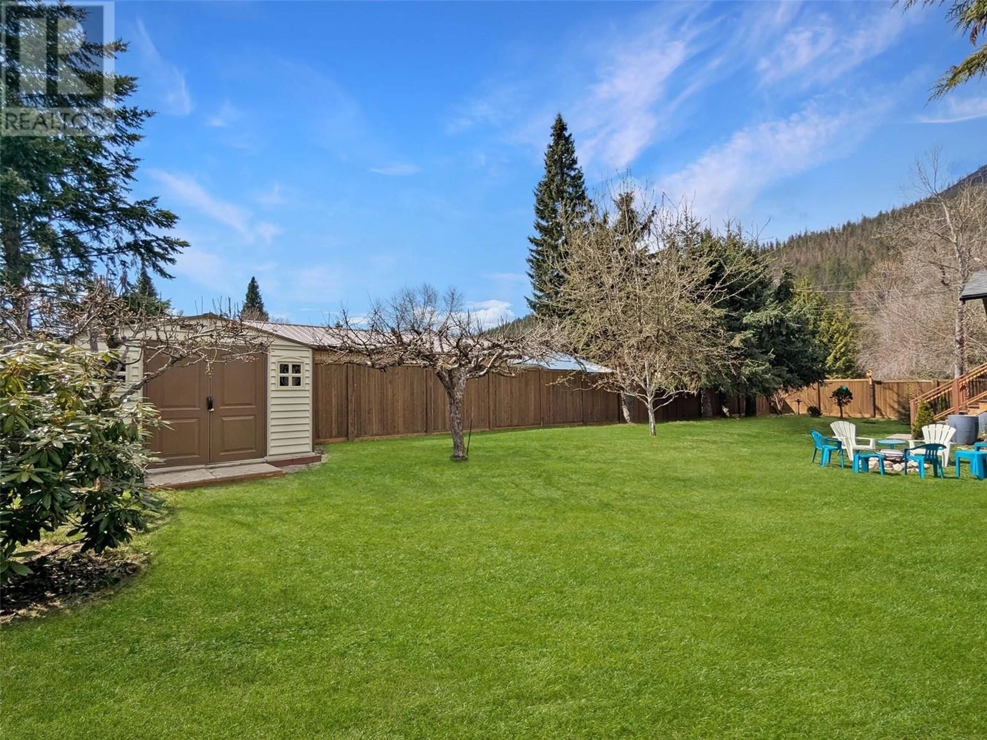 A pic from outside/outdoor area/front of a property/back of a property/a pic from drone, mountain view for 303 DELANY AVENUE, Slocan British Columbia V0G2C0