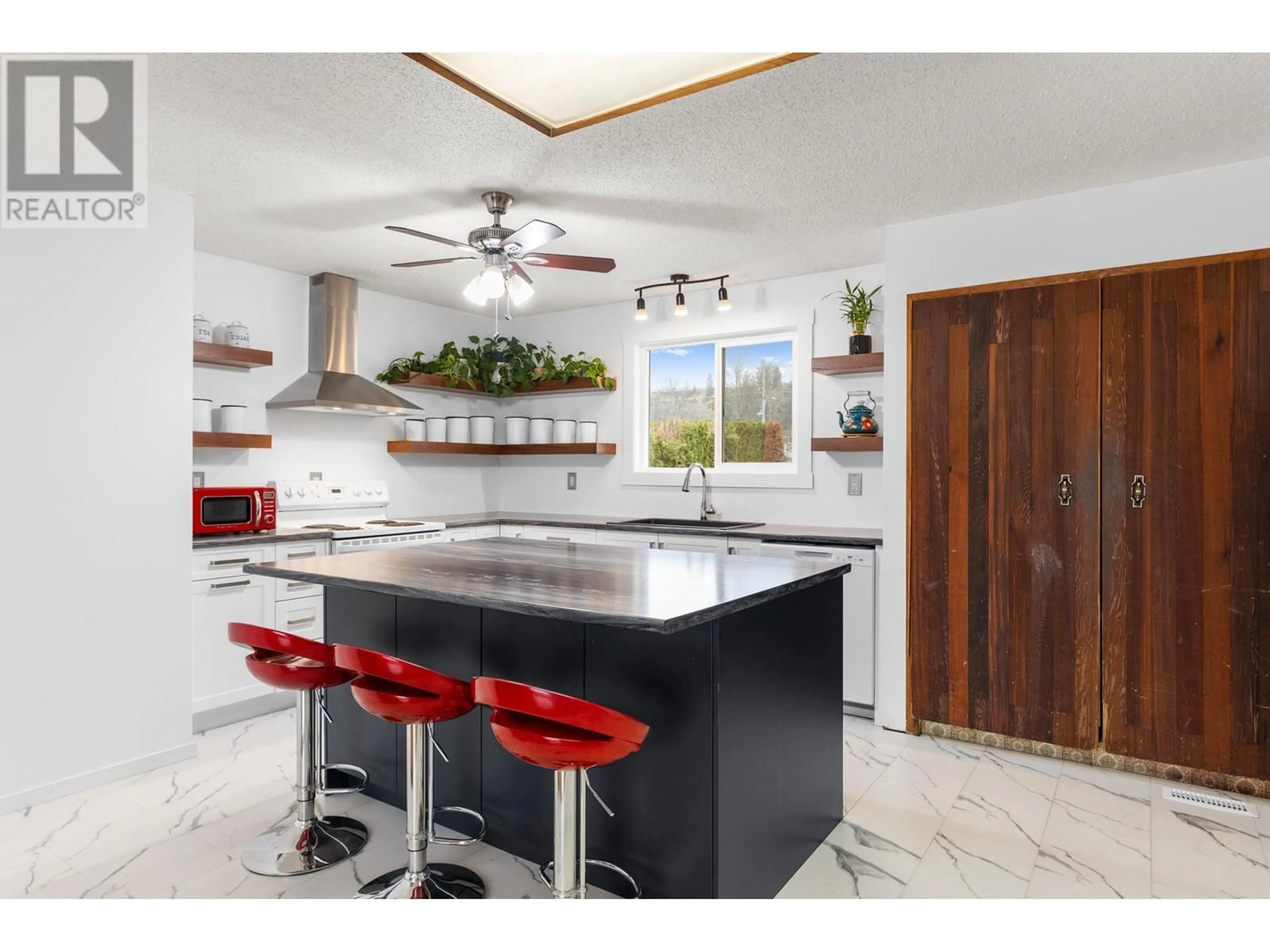 Open concept kitchen, ceramic/tile floor for 955 HICKORY ROAD, Kelowna British Columbia V1X4K8