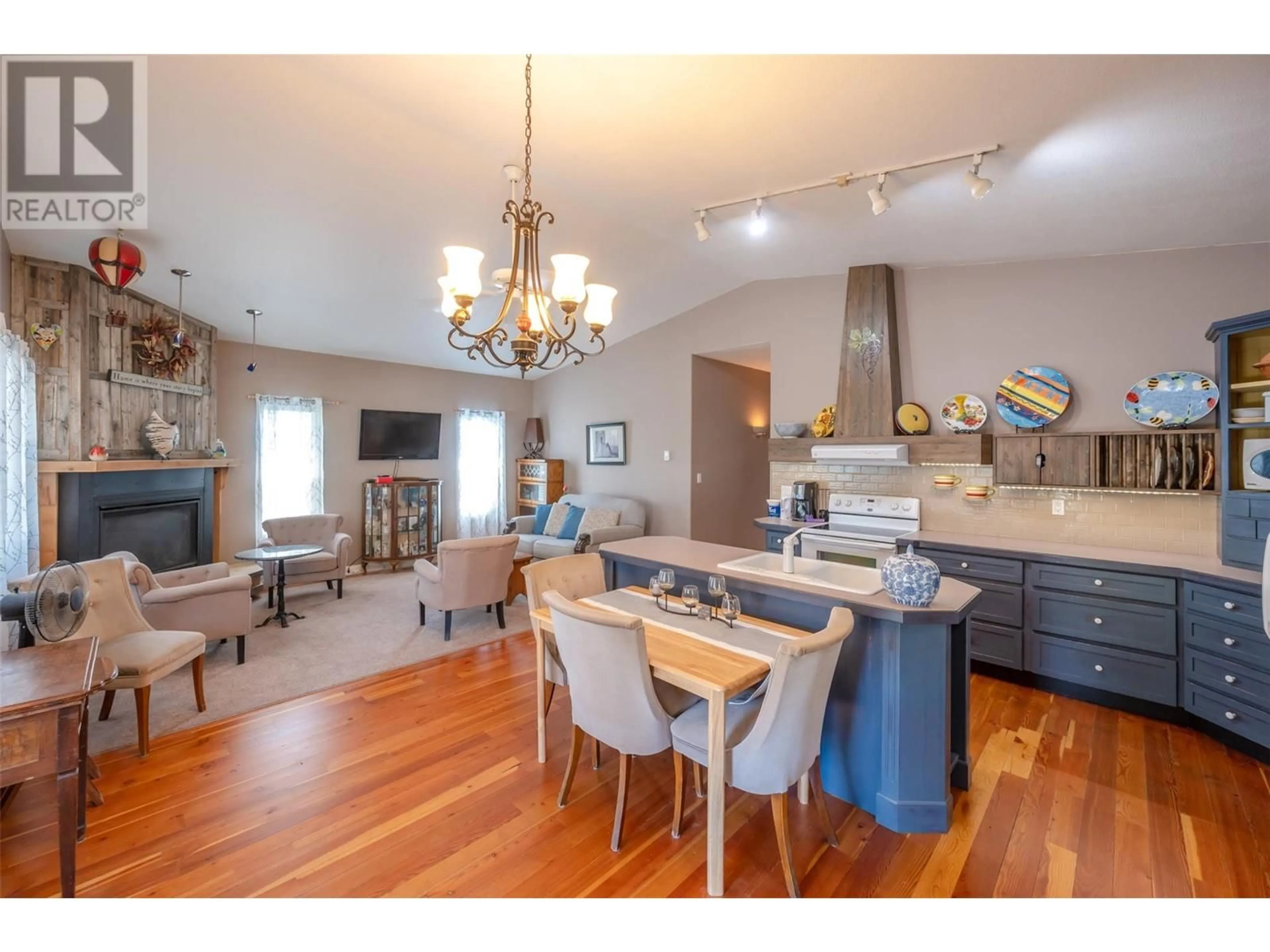 Open concept kitchen, wood/laminate floor for 1705 WALLIS ROAD, Okanagan Falls British Columbia V0H1R0
