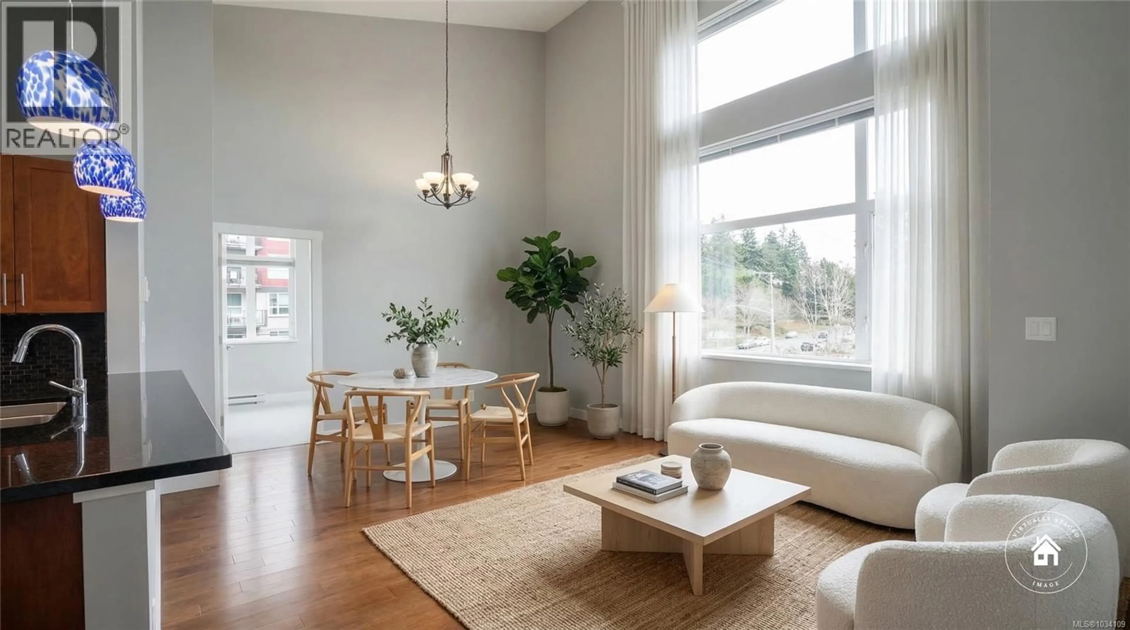 Living room with furniture, wood/laminate floor for 201 - 1629 TOWNSITE ROAD, Nanaimo British Columbia V9S1N3
