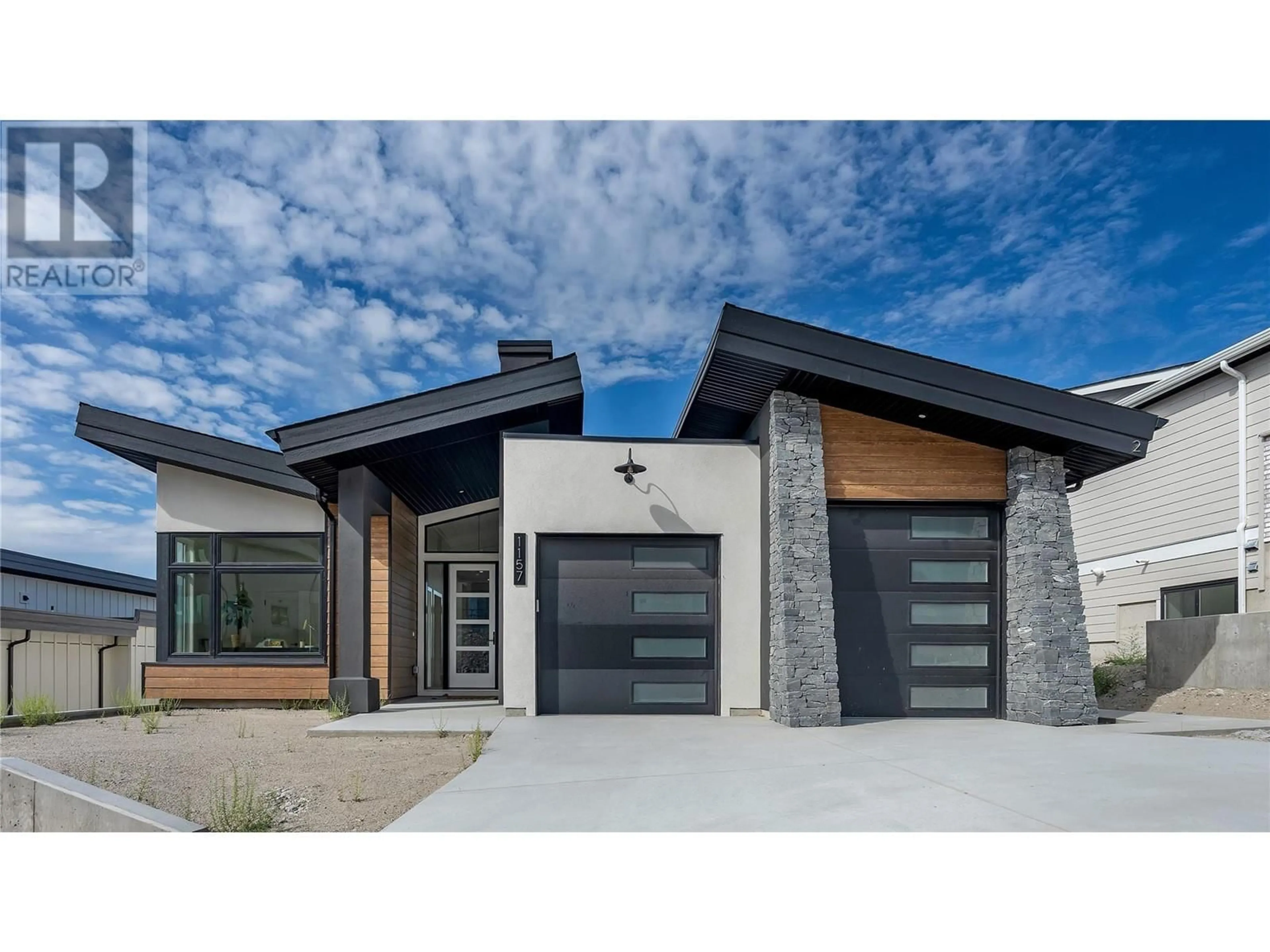 Home with brick exterior material, street for 1157 ELK STREET, Penticton British Columbia V2A0C9
