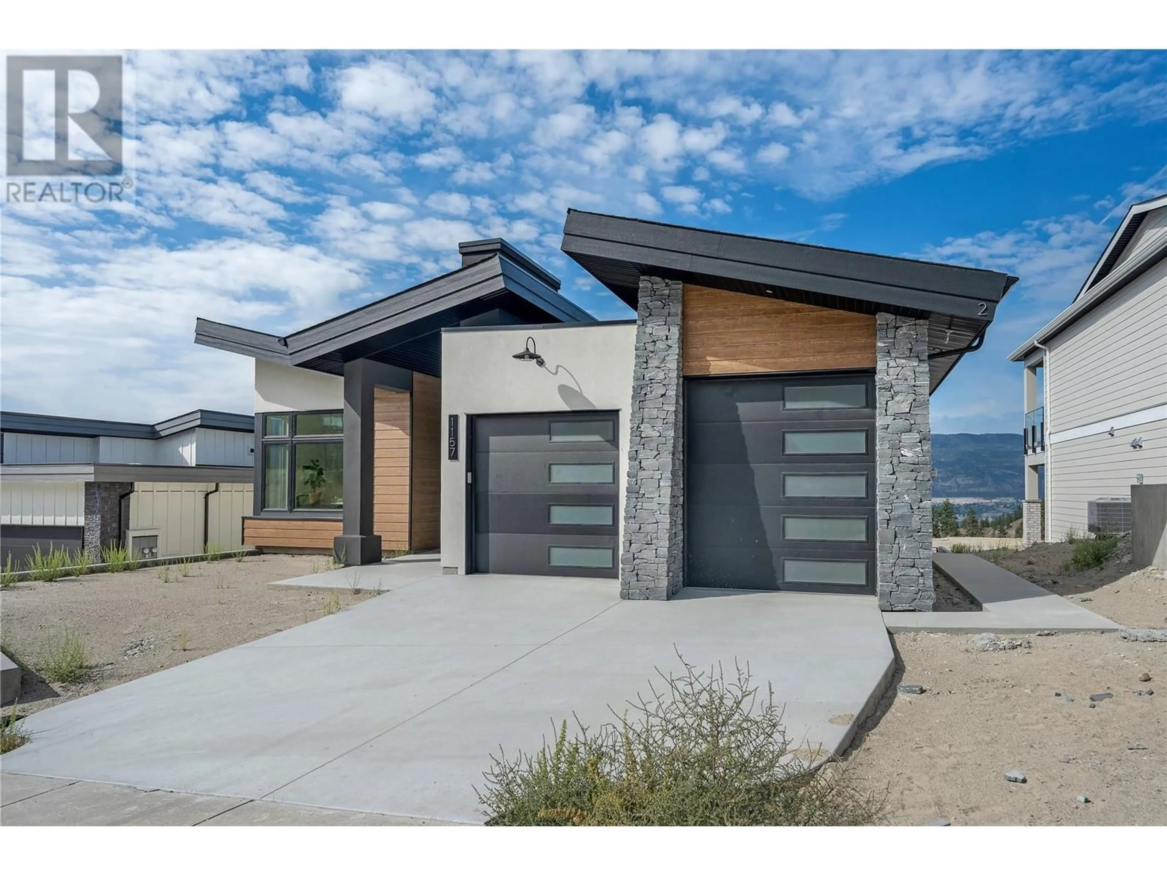 Home with brick exterior material, street for 1157 ELK STREET, Penticton British Columbia V2A0C9