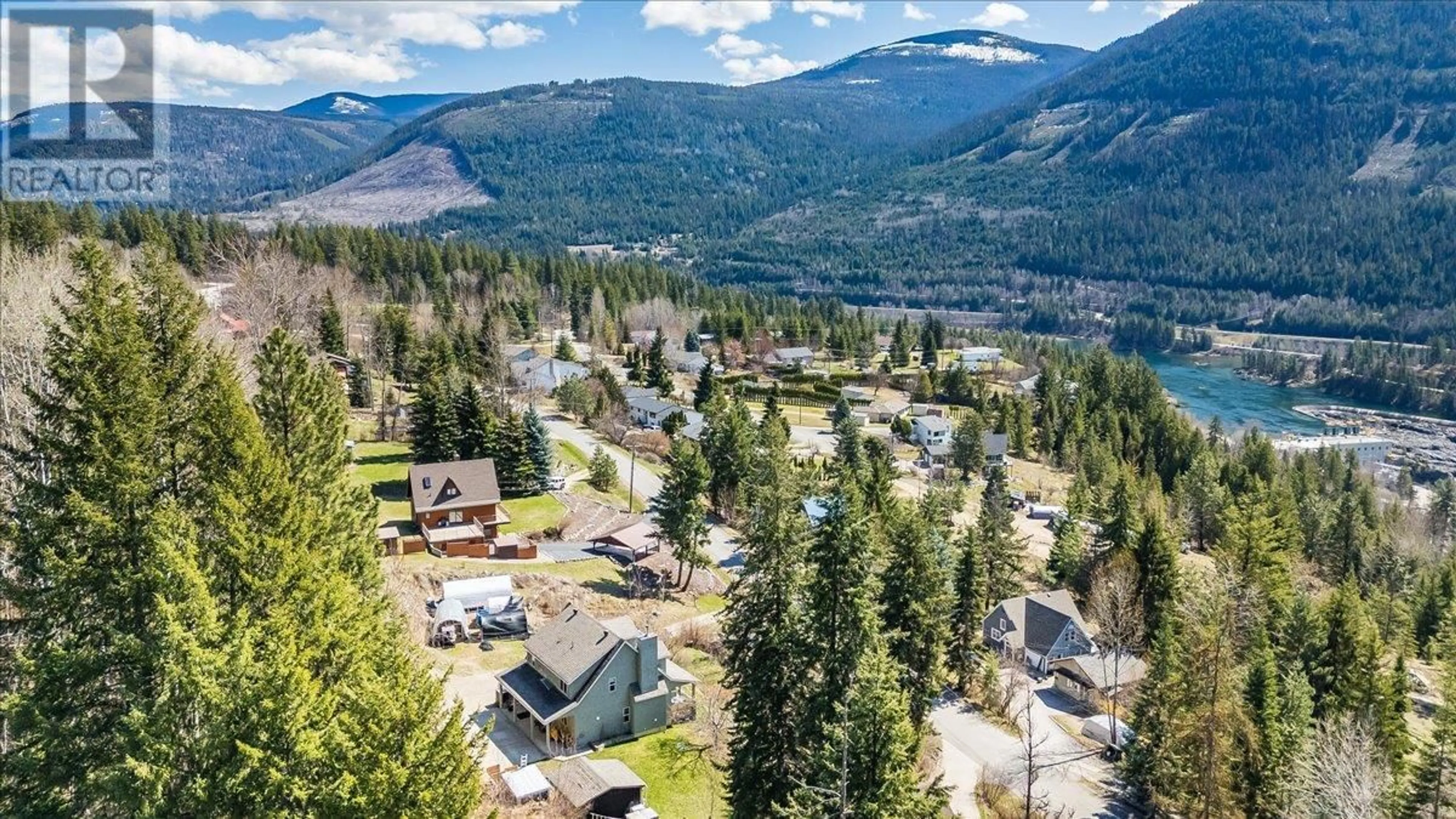 A pic from outside/outdoor area/front of a property/back of a property/a pic from drone, mountain view for 3829 AARON ROAD, Bonnington British Columbia V0G2G3