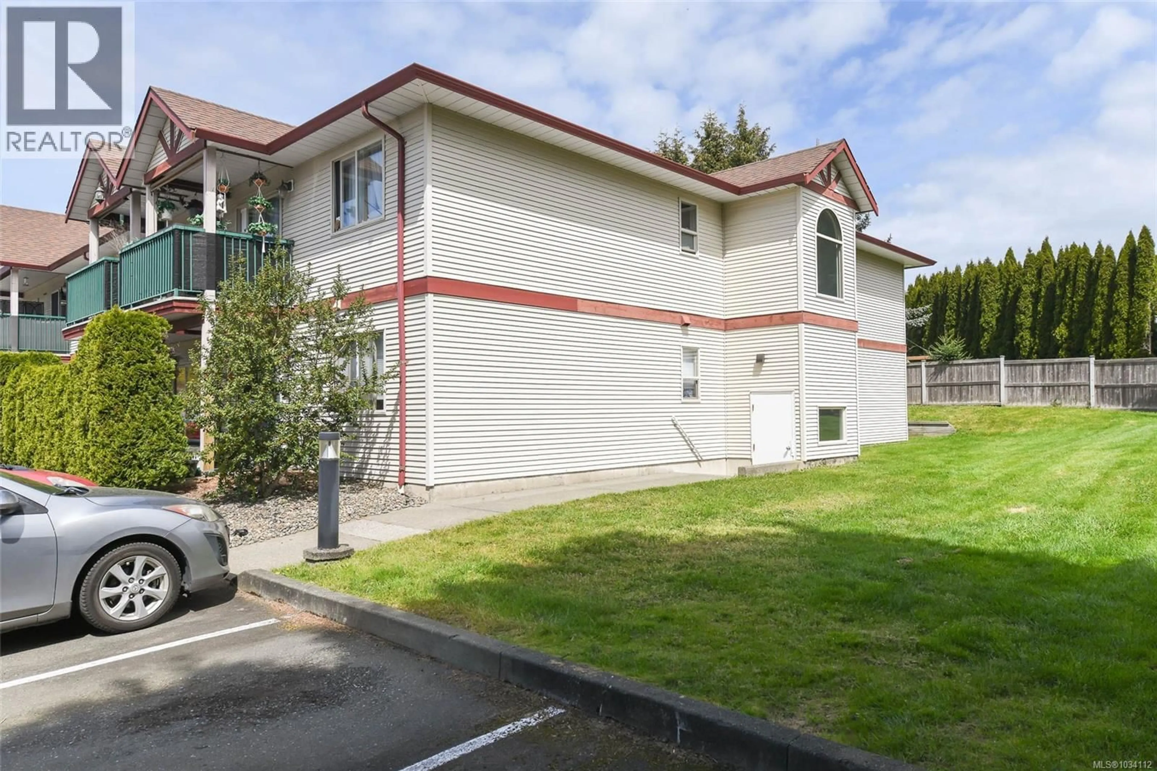 A pic from outside/outdoor area/front of a property/back of a property/a pic from drone, street for 106 - 1450 TUNNER DRIVE, Courtenay British Columbia V9N9A6