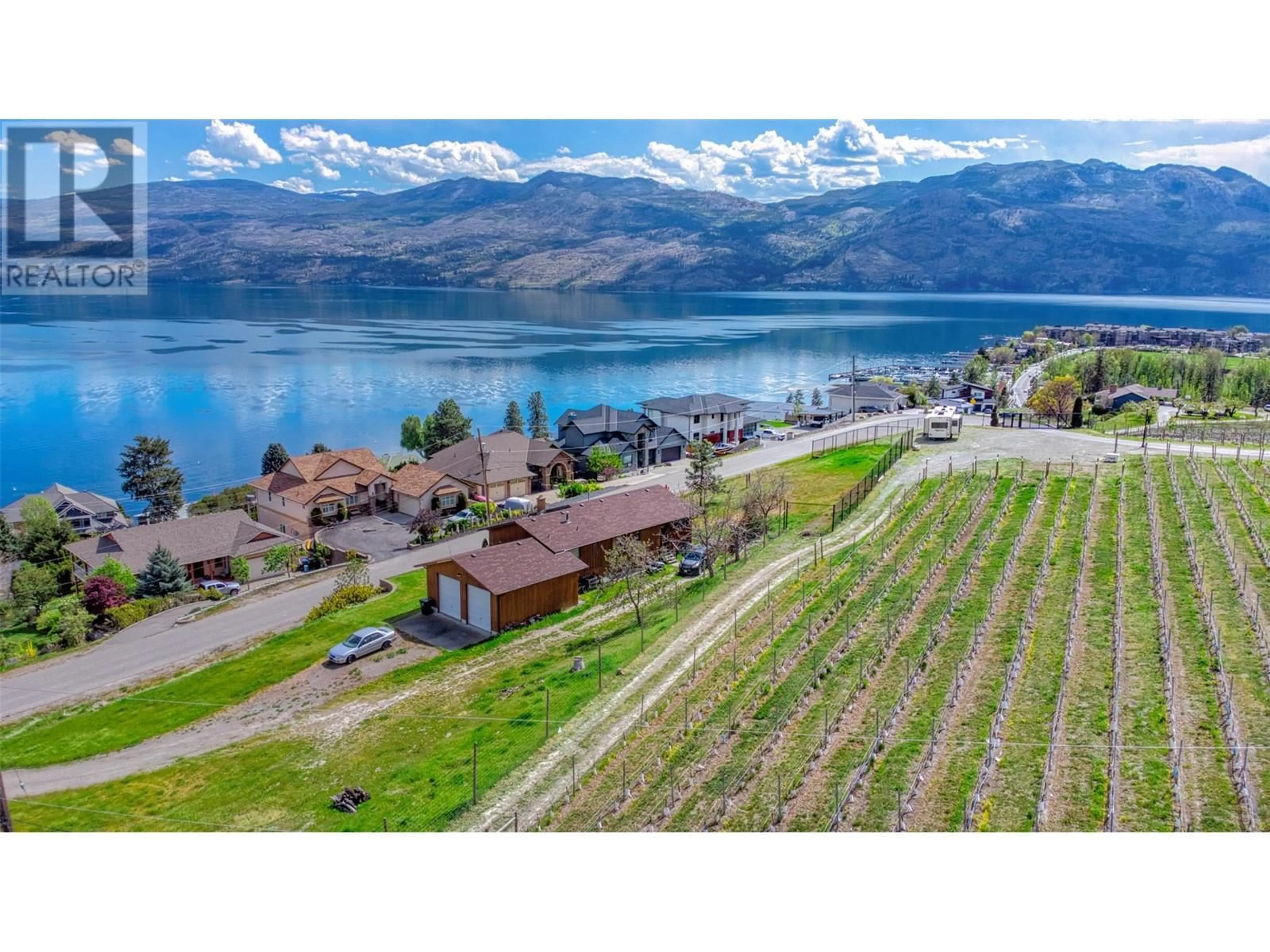 A pic from outside/outdoor area/front of a property/back of a property/a pic from drone, water/lake/river/ocean view for 3924 HARDING ROAD, West Kelowna British Columbia V4T2J9