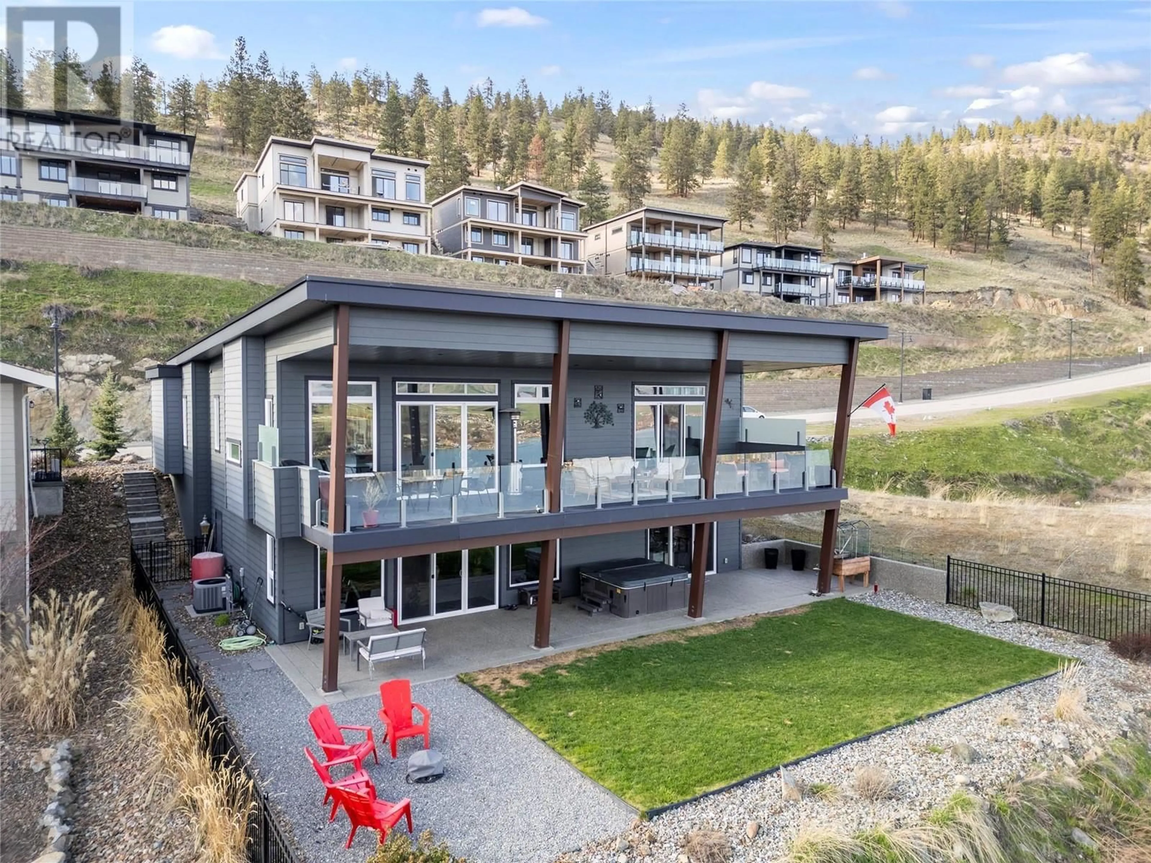 A pic from outside/outdoor area/front of a property/back of a property/a pic from drone, water/lake/river/ocean view for 8856 TAVISTOCK ROAD, Vernon British Columbia V1H2K9