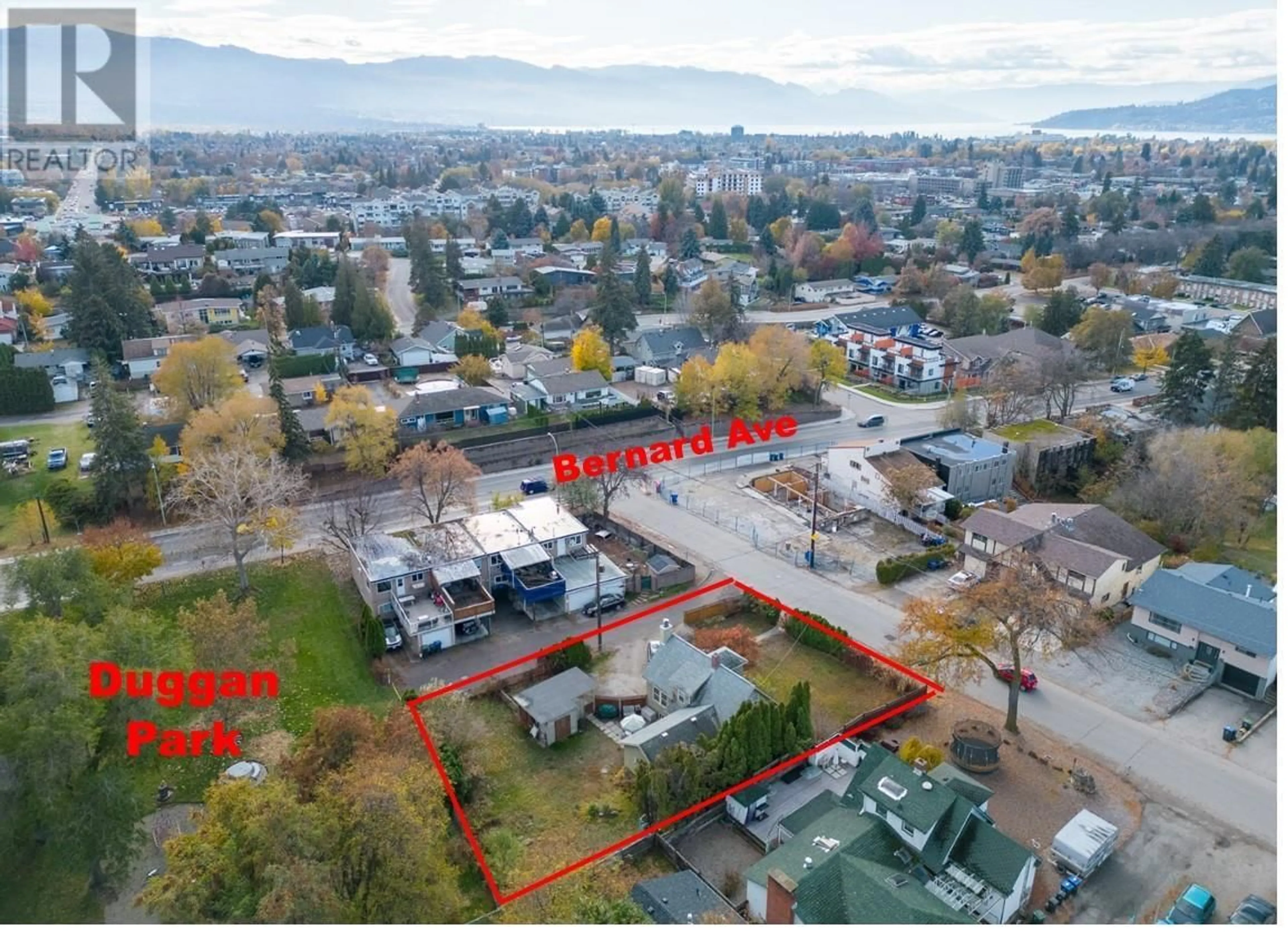 A pic from outside/outdoor area/front of a property/back of a property/a pic from drone, mountain view for 1485 HIGHLAND DRIVE SOUTH, Kelowna British Columbia V1Y3W3
