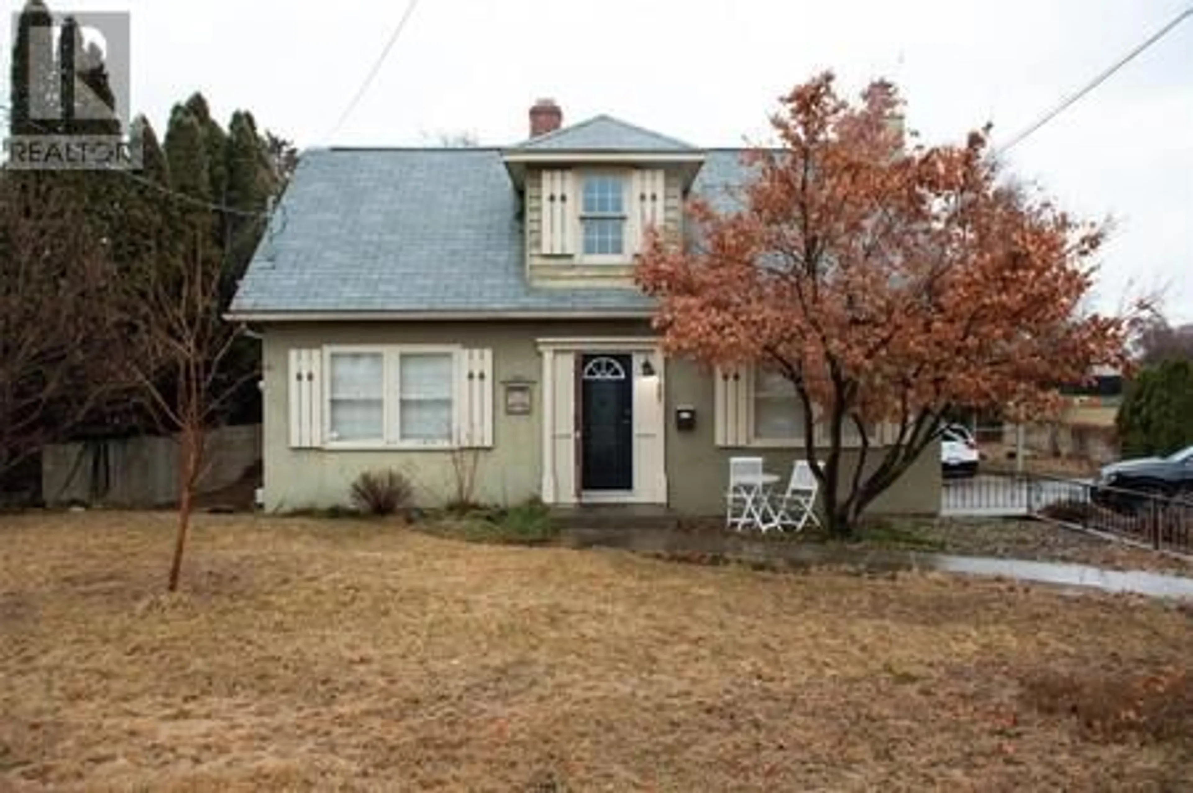 Home with vinyl exterior material, street for 1485 HIGHLAND DRIVE SOUTH, Kelowna British Columbia V1Y3W3