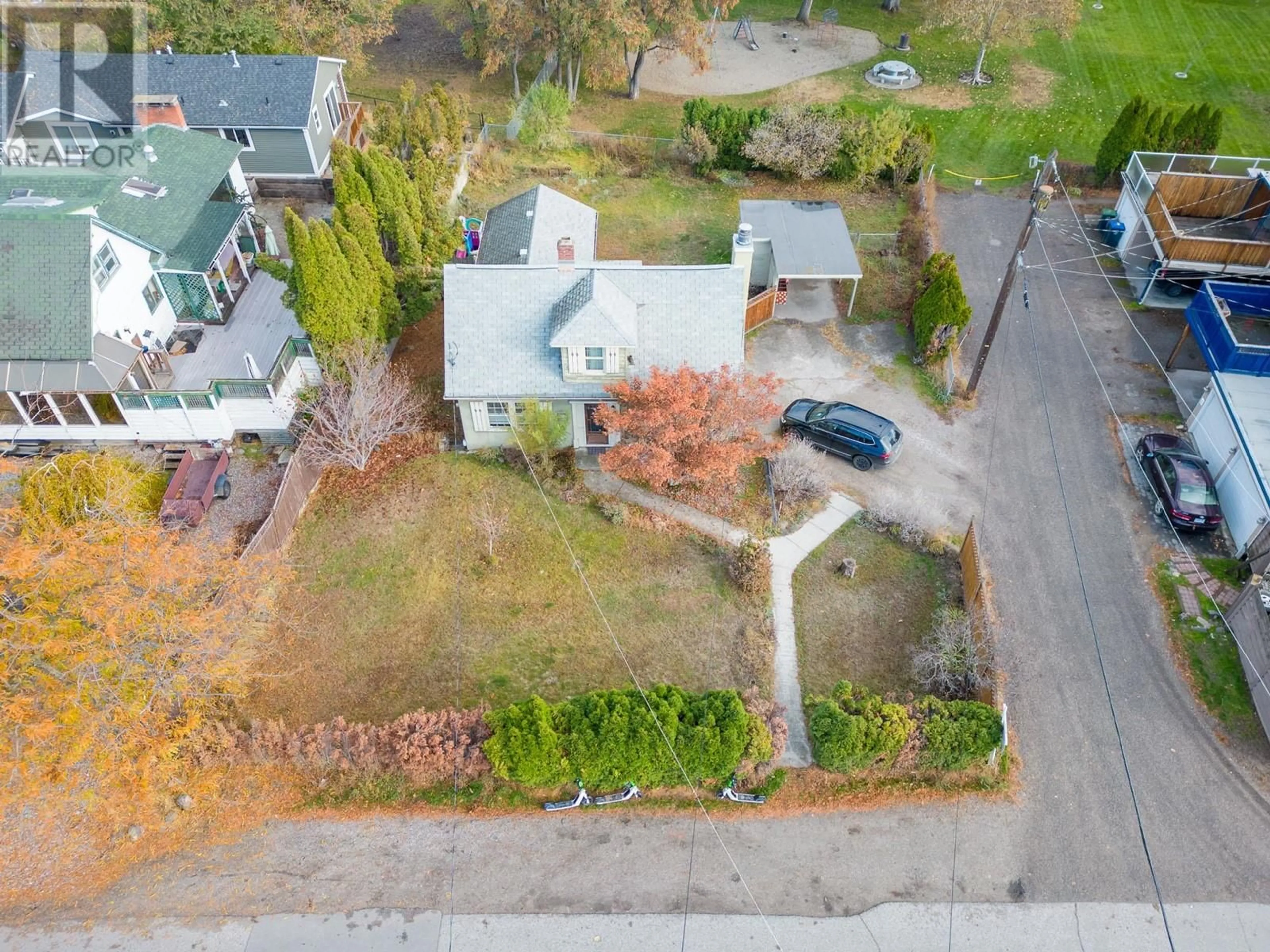 A pic from outside/outdoor area/front of a property/back of a property/a pic from drone, street for 1485 HIGHLAND DRIVE SOUTH, Kelowna British Columbia V1Y3W3