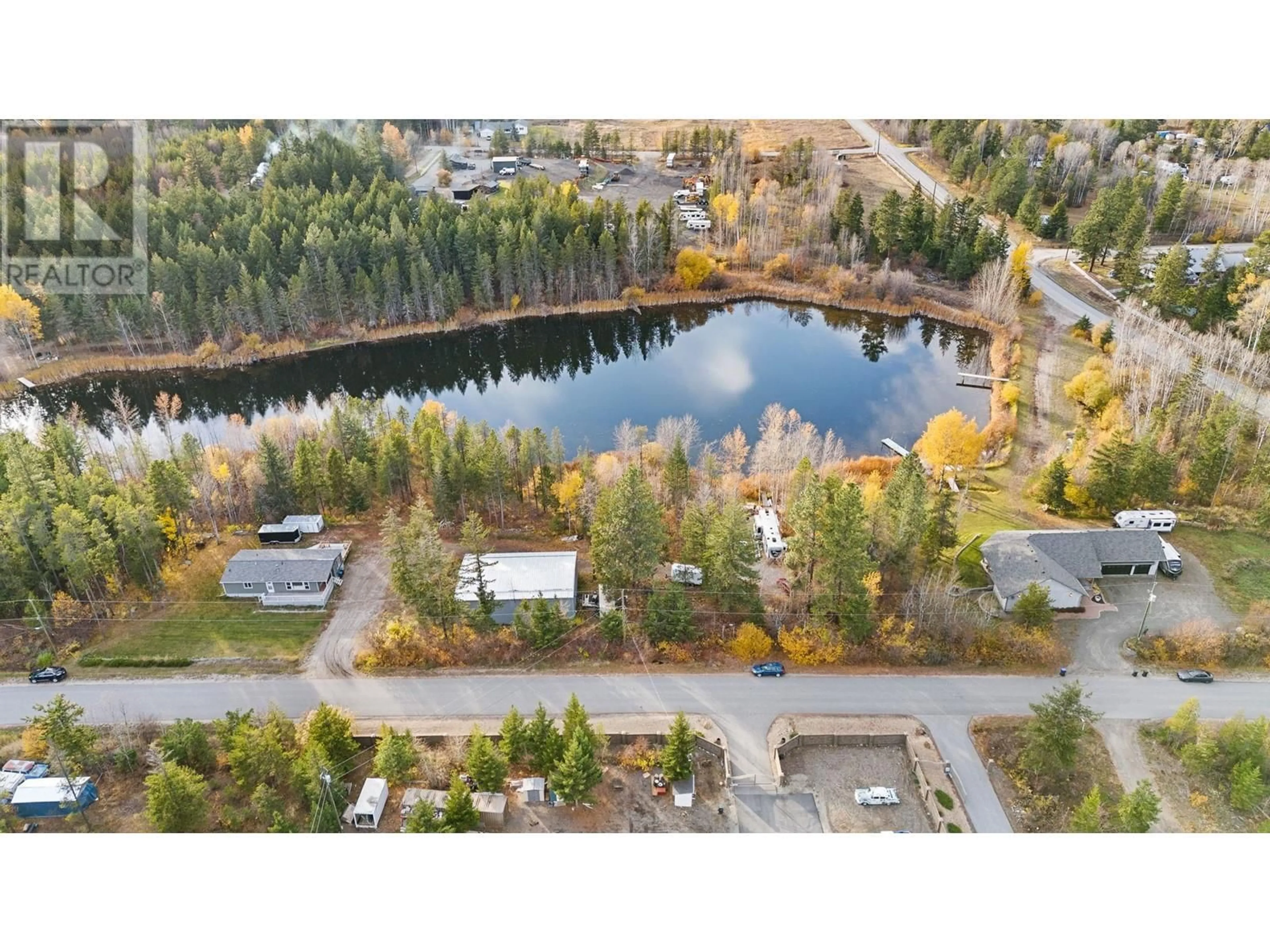 A pic from outside/outdoor area/front of a property/back of a property/a pic from drone, water/lake/river/ocean view for 3330 MCKELLAR ROAD, West Kelowna British Columbia V4T1W1