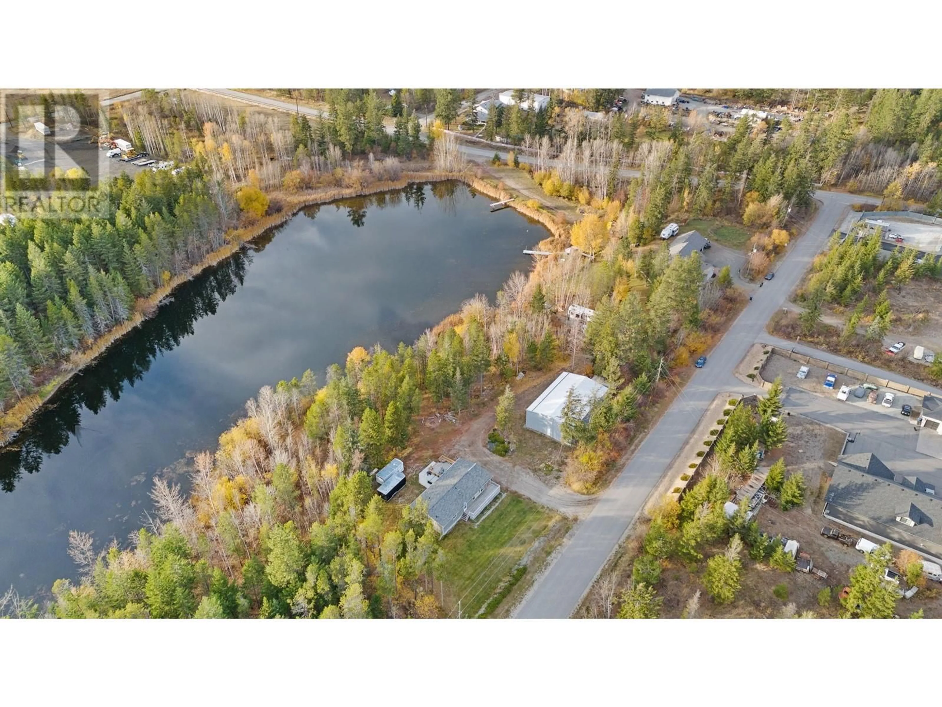 A pic from outside/outdoor area/front of a property/back of a property/a pic from drone, water/lake/river/ocean view for 3330 MCKELLAR ROAD, West Kelowna British Columbia V4T1W1