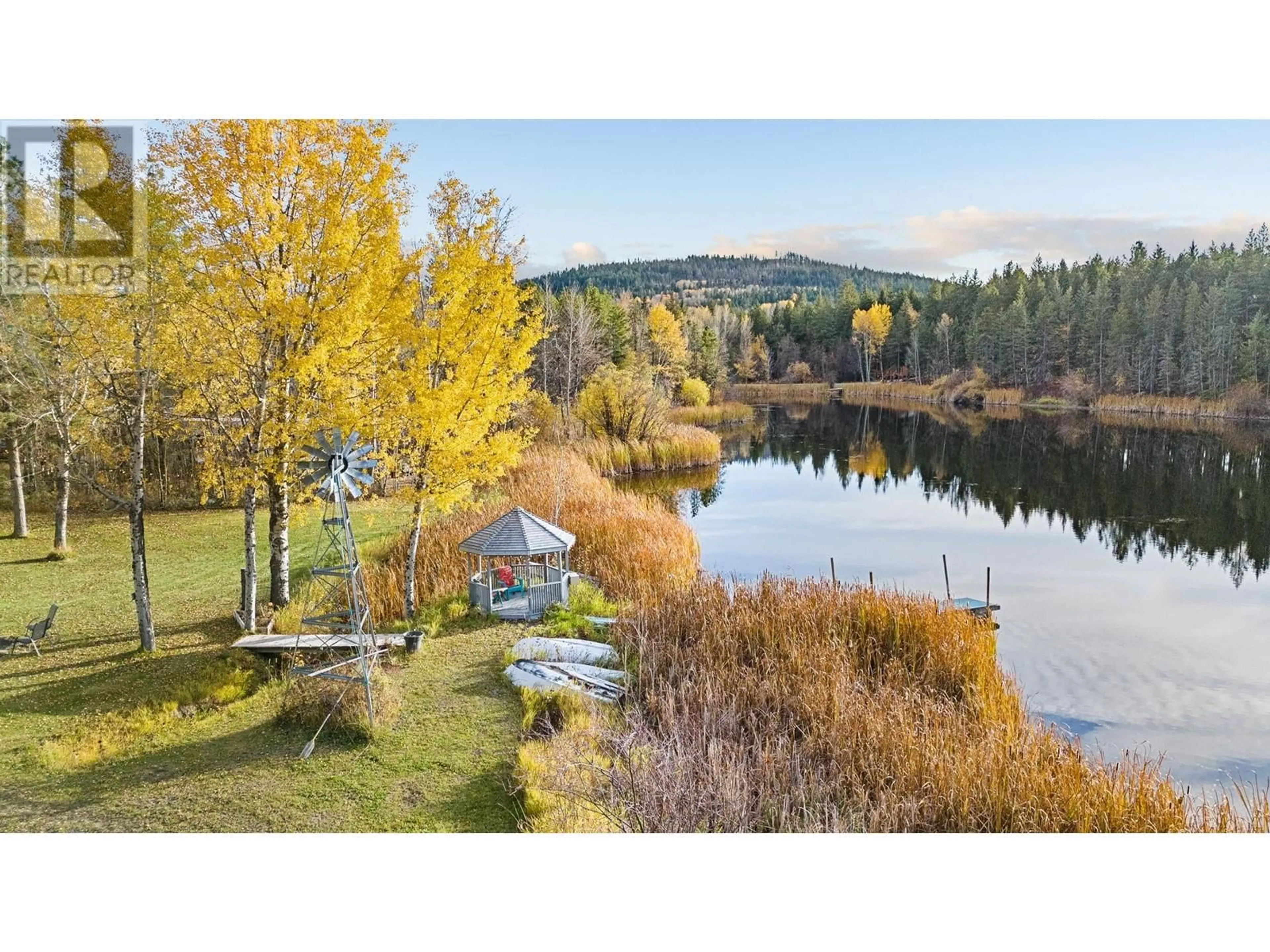 A pic from outside/outdoor area/front of a property/back of a property/a pic from drone, water/lake/river/ocean view for 3330 MCKELLAR ROAD, West Kelowna British Columbia V4T1W1
