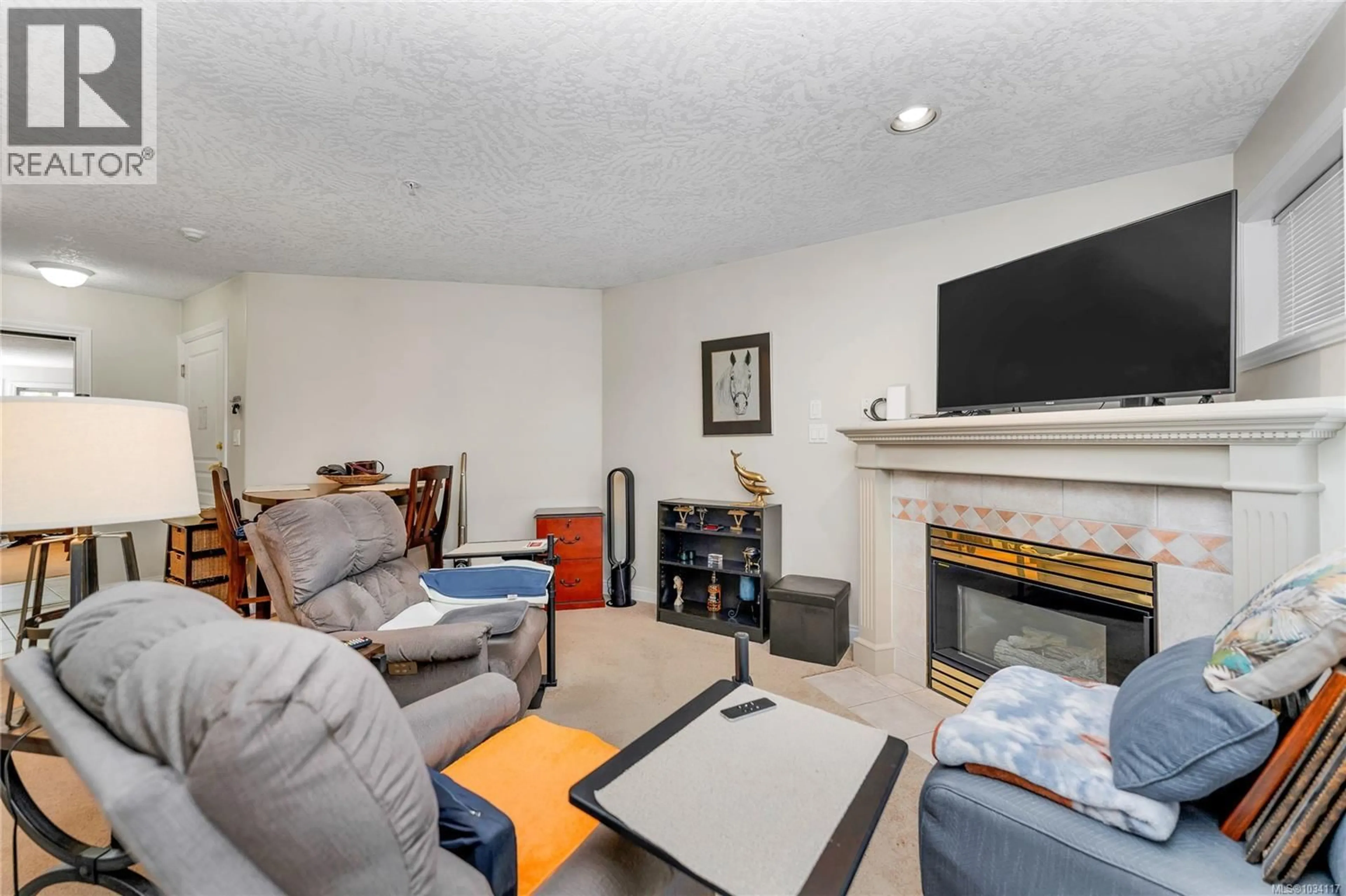 Living room with furniture, unknown for 104 - 1580 CHRISTMAS AVENUE, Saanich British Columbia V8P2X2