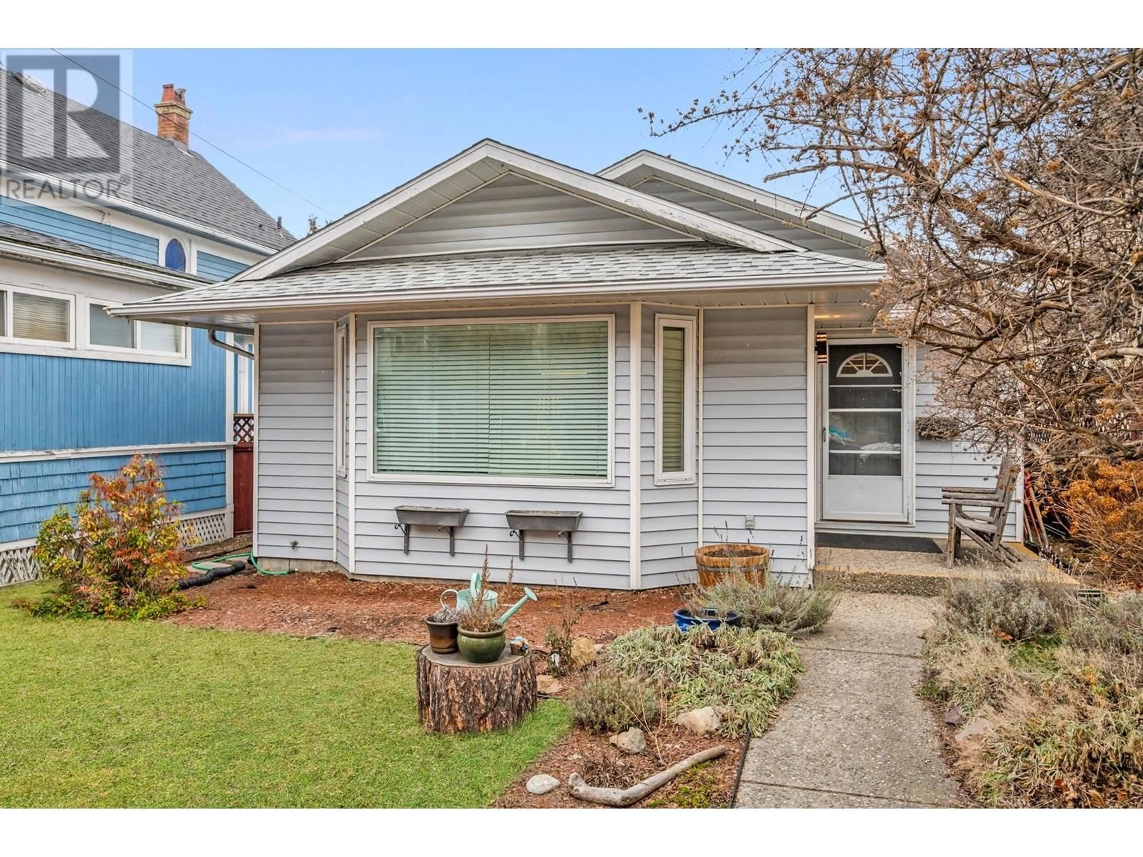 Home with vinyl exterior material, street for 181 WADE AVENUE WEST, Penticton British Columbia V2A1T7