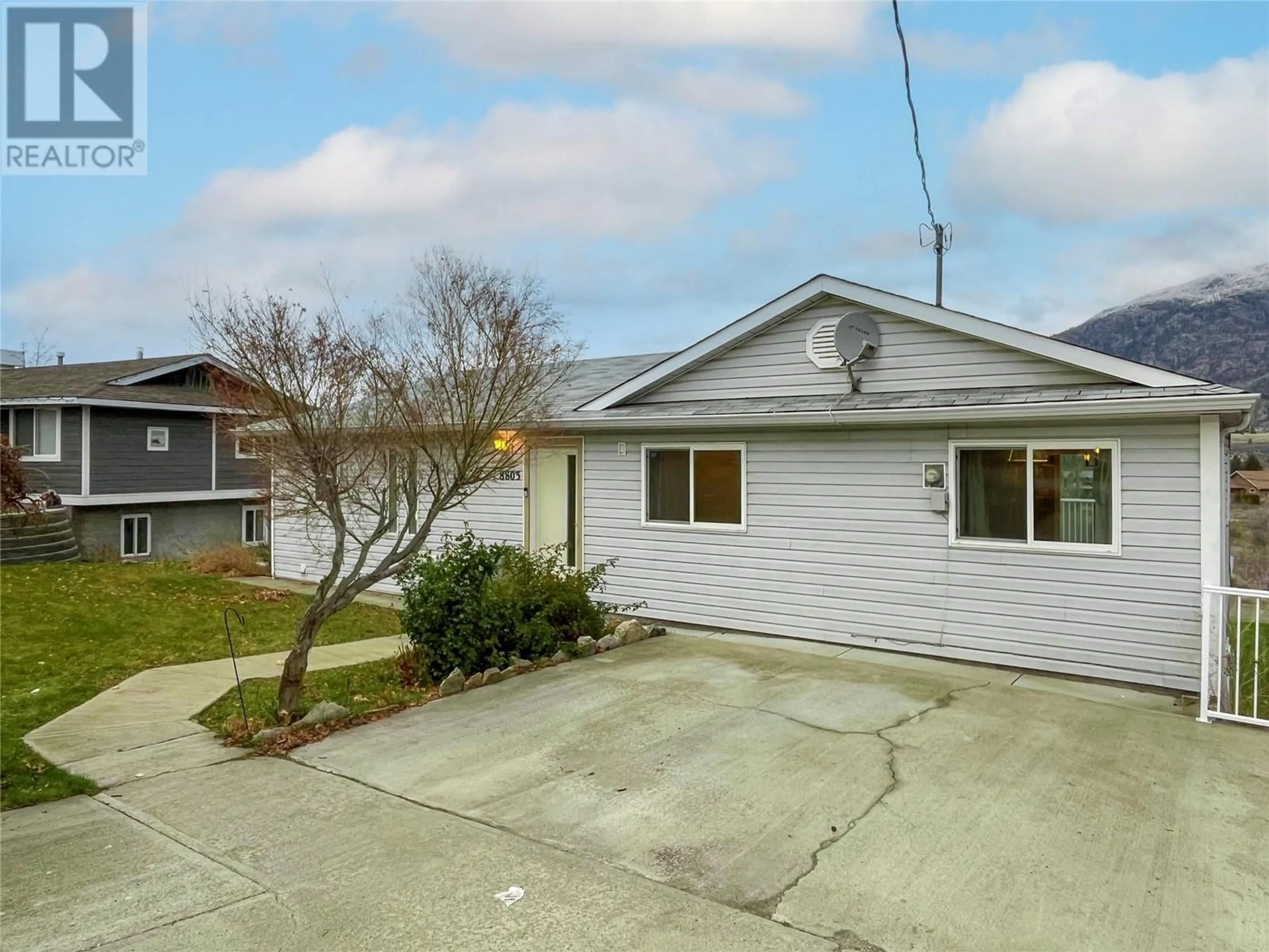 A pic from outside/outdoor area/front of a property/back of a property/a pic from drone, street for 8803 GALA CRESCENT, Osoyoos British Columbia V0H1V2