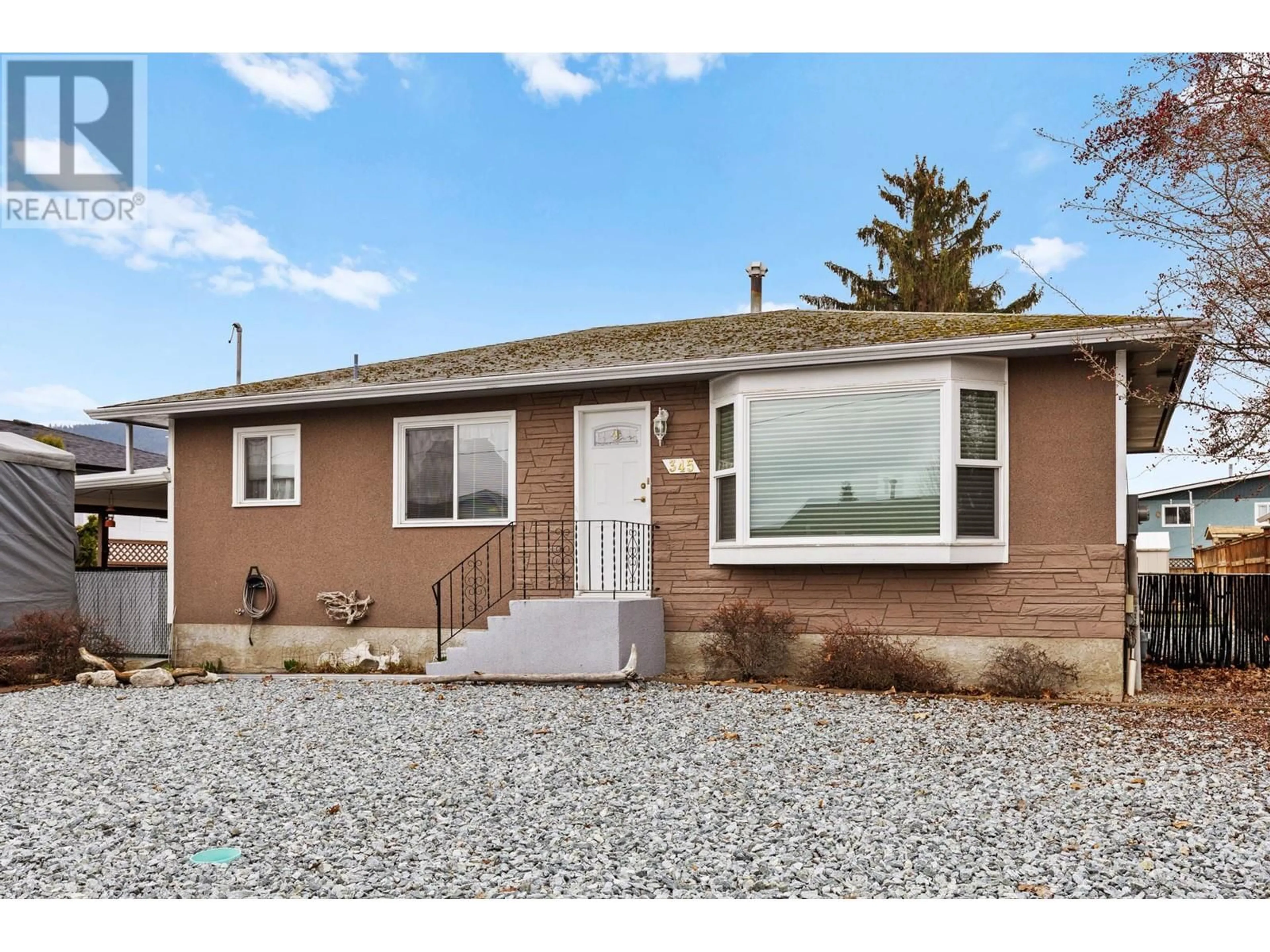 Home with vinyl exterior material, street for 345 HARDIE ROAD, Kelowna British Columbia V1X2G9